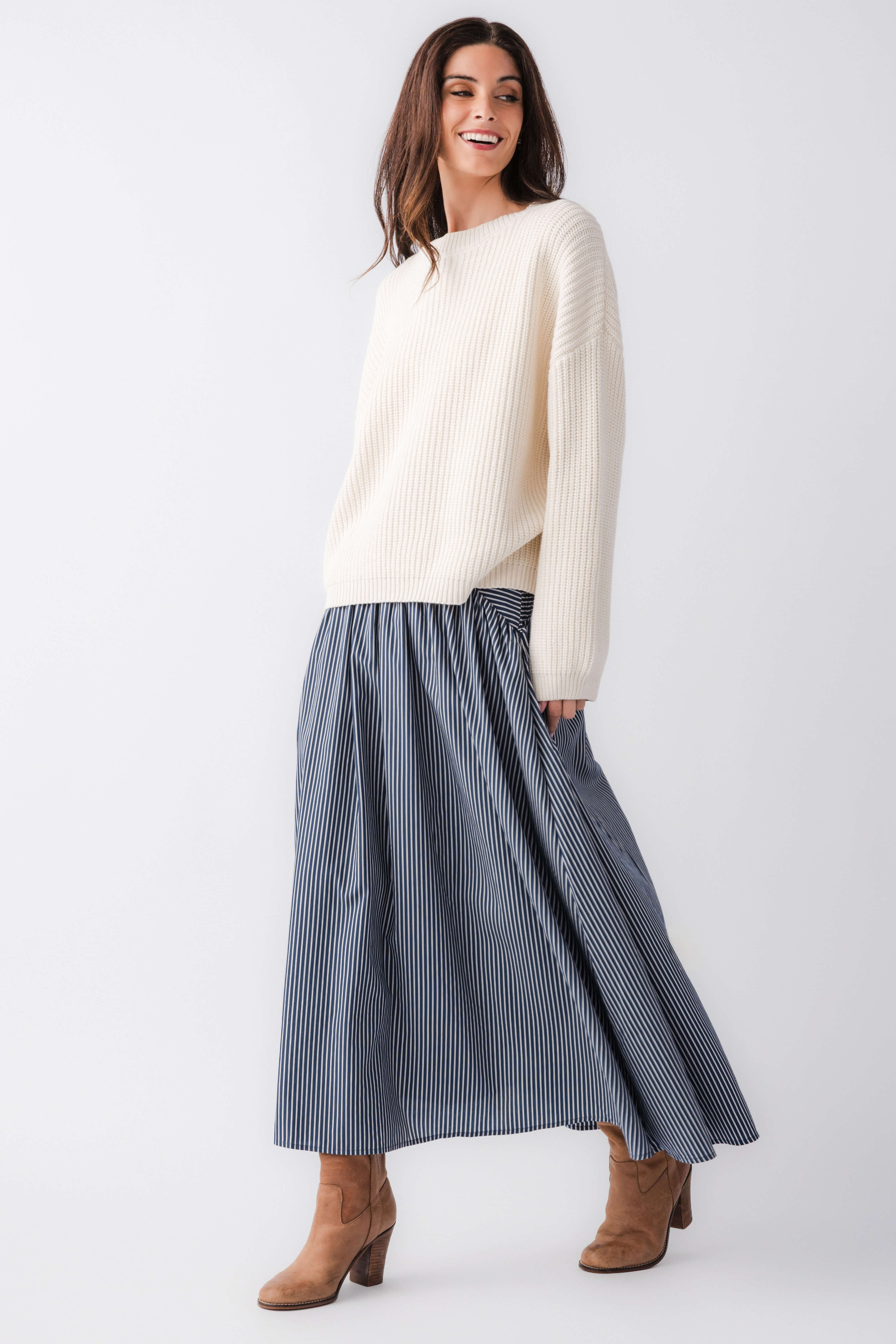 Blue-and-white striped maxi skirt with gathered drop-waist seam and flared hem
