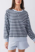 Women’s striped crewneck sweatshirt in navy and white with long sleeves and banded hem