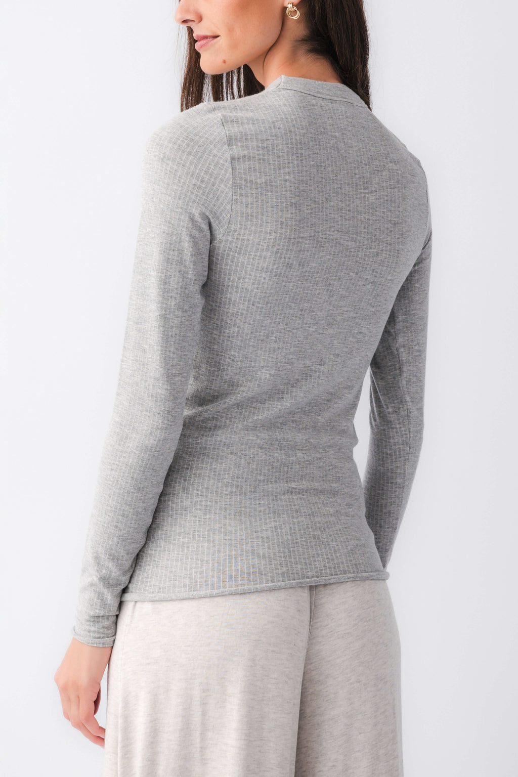 Heather grey seamless long sleeve top, crew neck back view, fitted silhouette