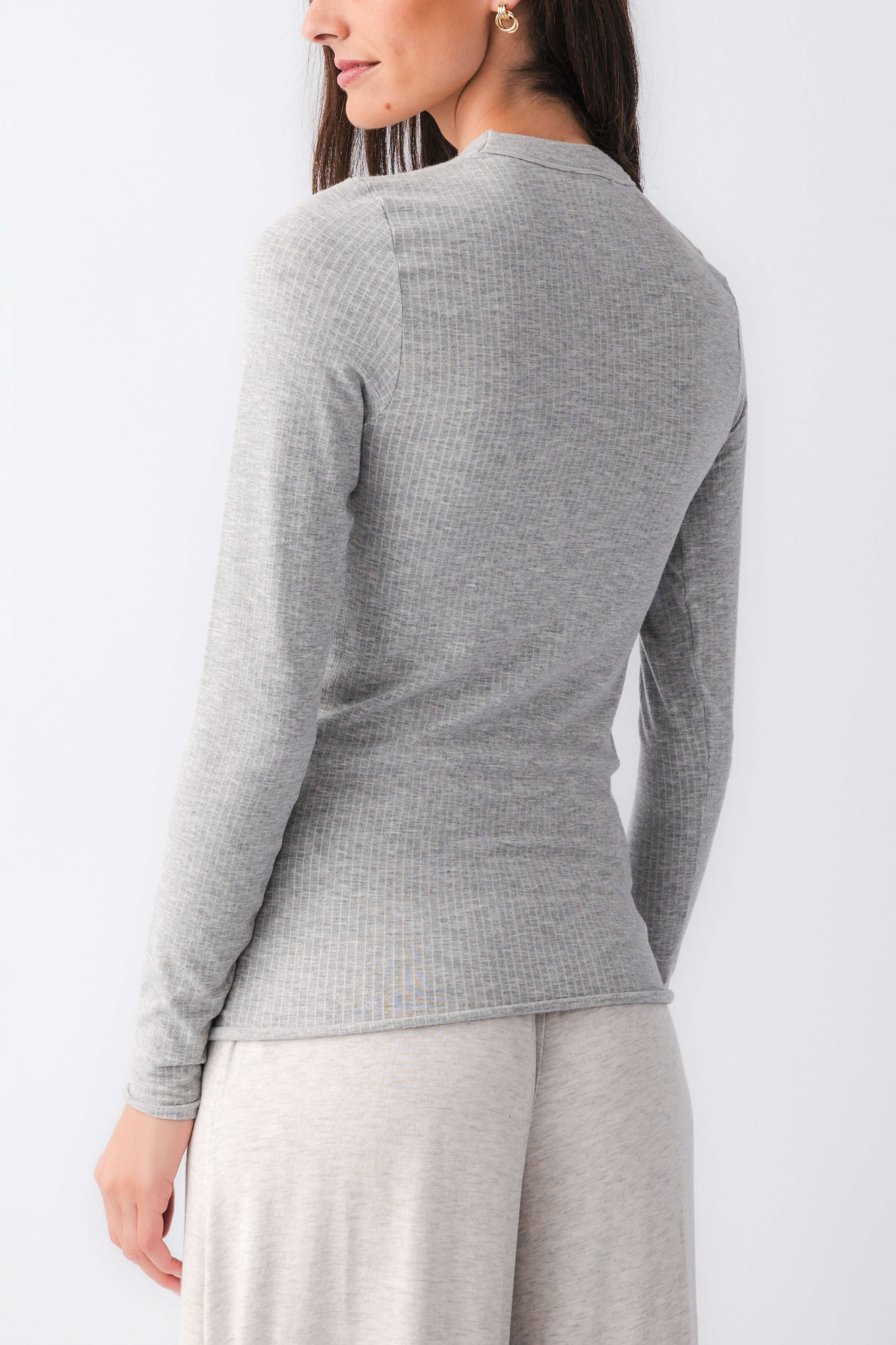 Heather grey seamless long sleeve top, crew neck back view, fitted silhouette