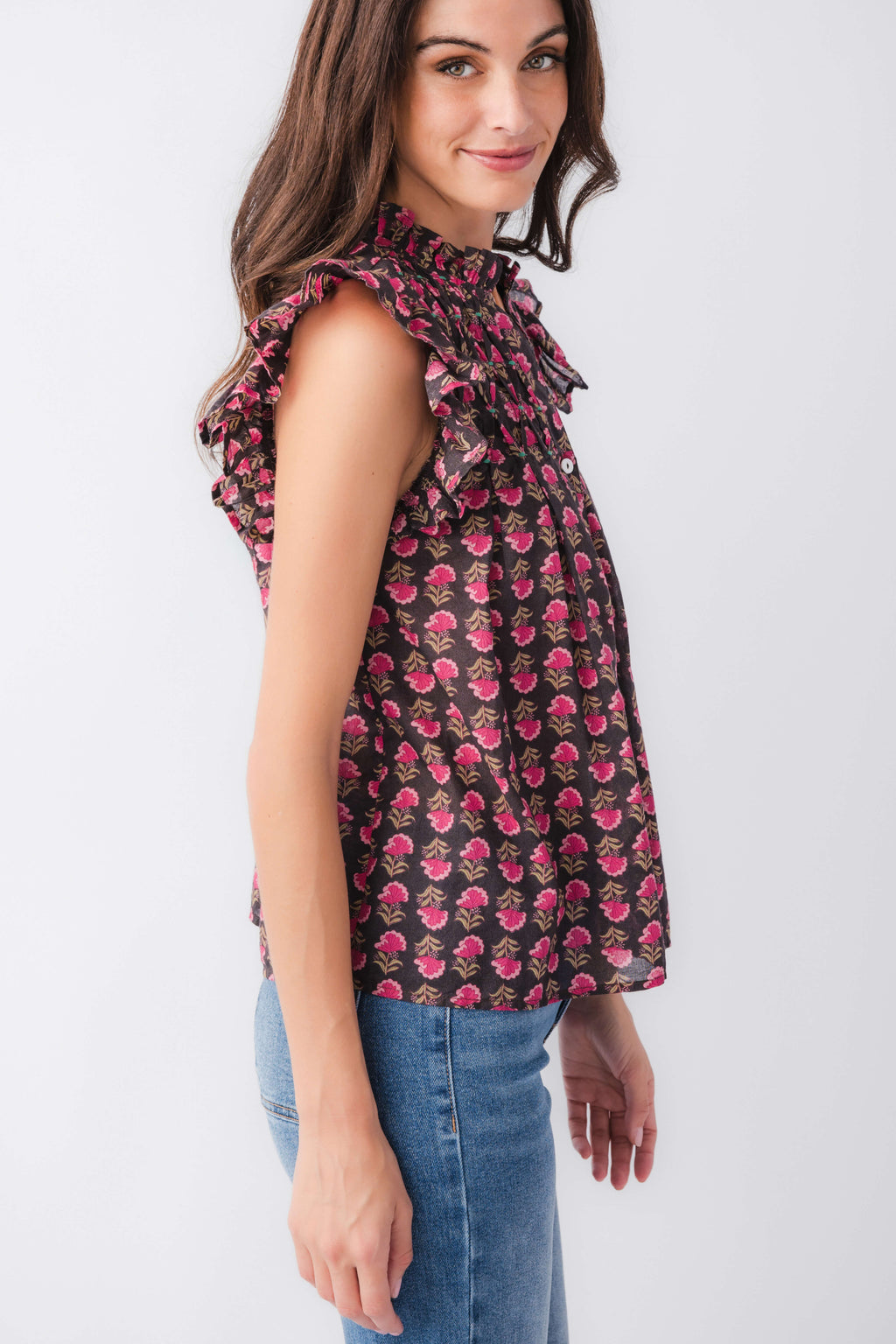 Flutter sleeve button-up top with dark base and pink block print, front button placket