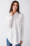 White poplin button-down top with pointed collar and long sleeves