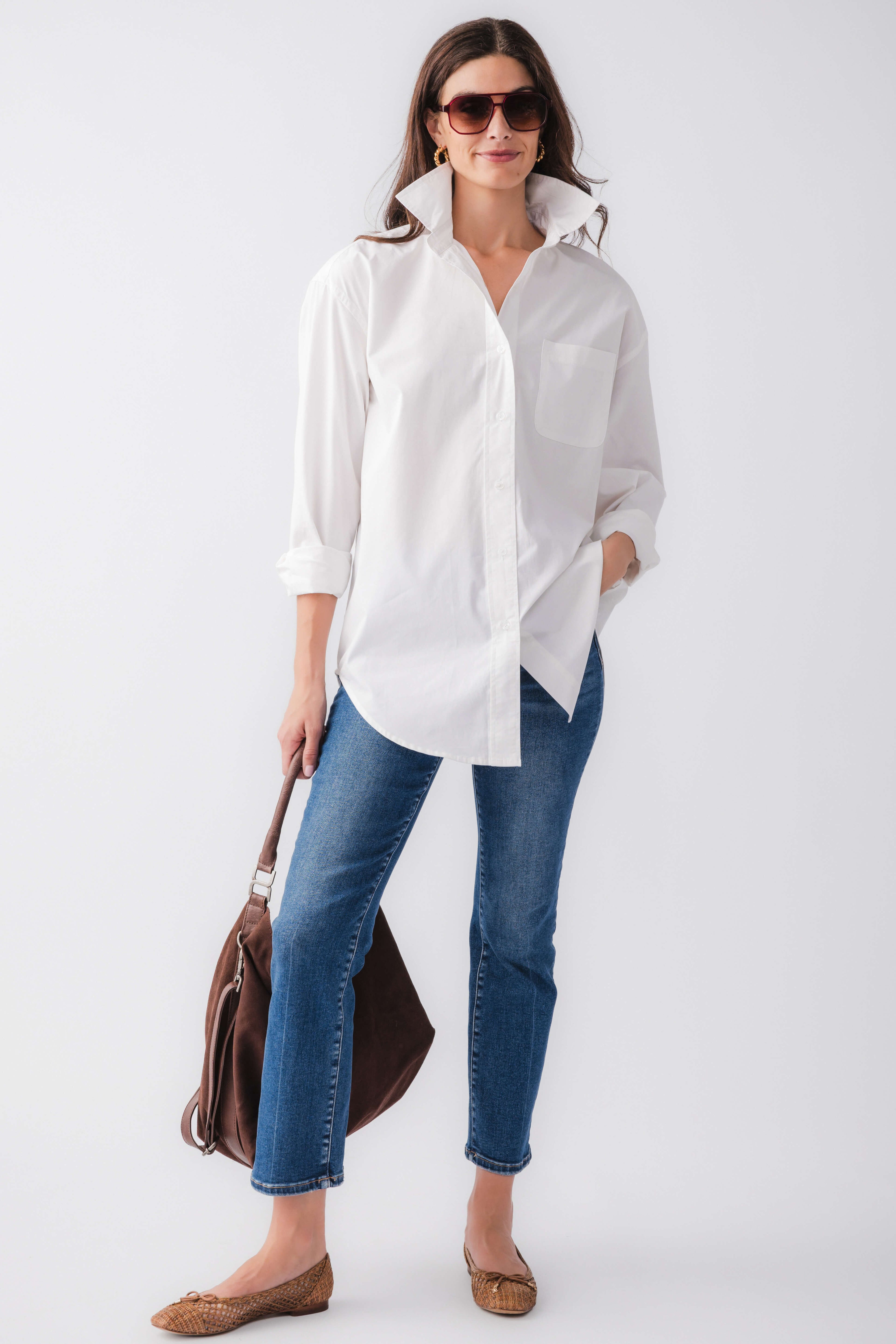 White poplin button-down top with pointed collar, button front, and long sleeves