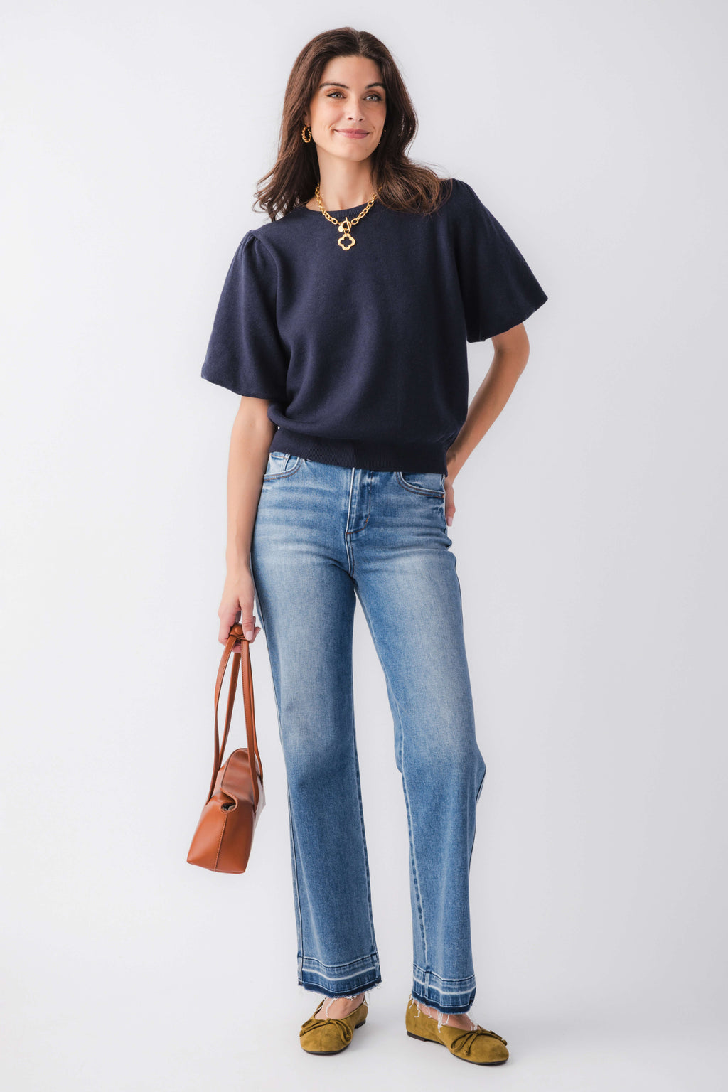 Navy solid knit bubble-sleeve top with crew neckline and short wide sleeves