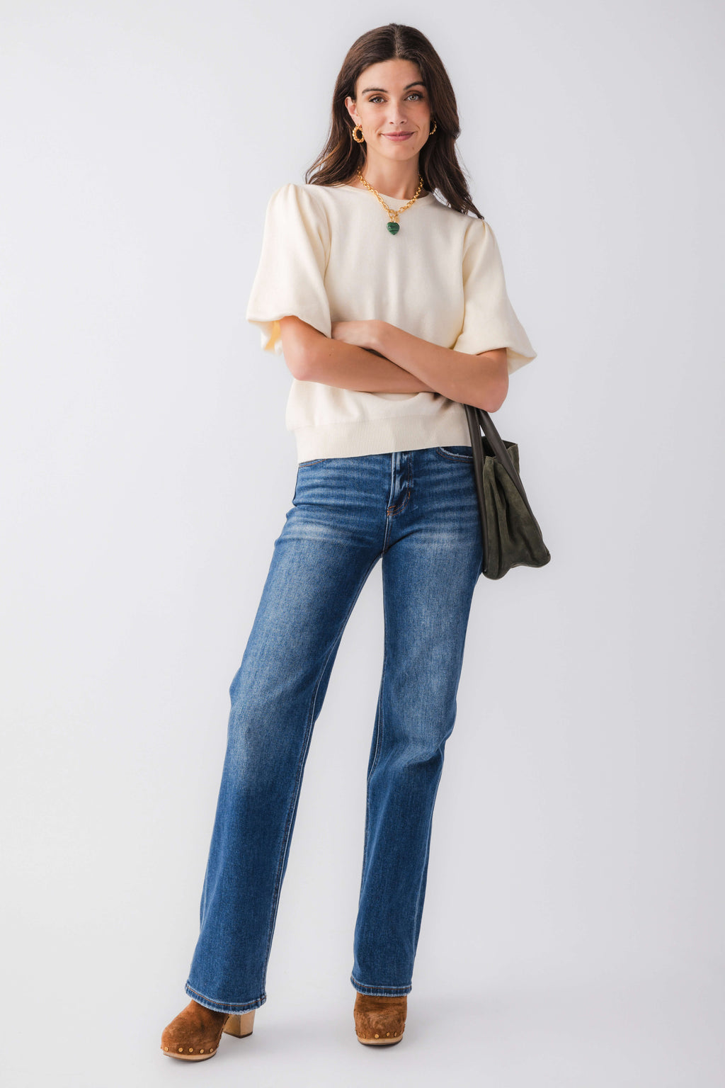 Cream knit bubble-sleeve top with crew neck and relaxed, short sleeves