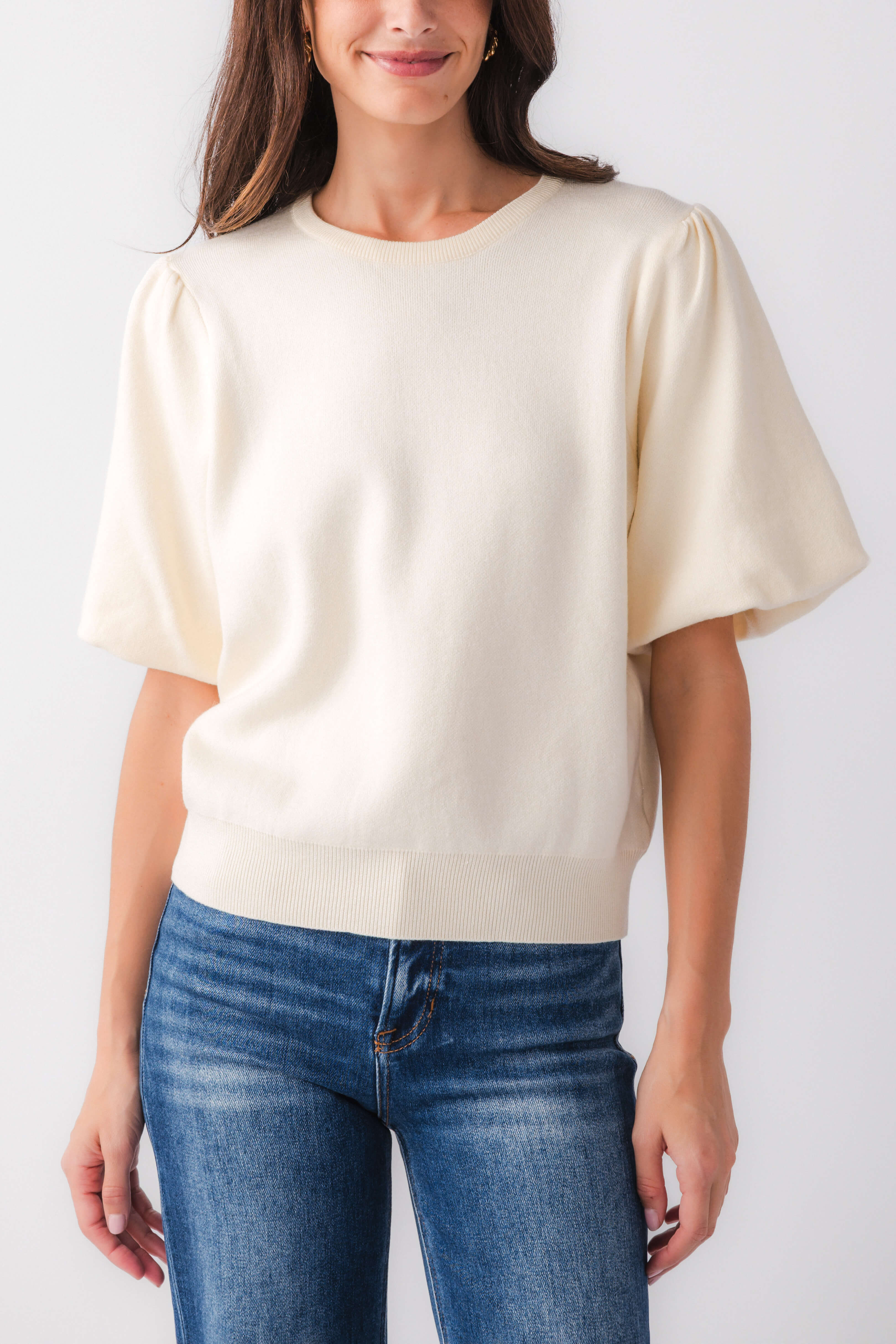 Cream solid knit bubble-sleeve top with short cuffed sleeves