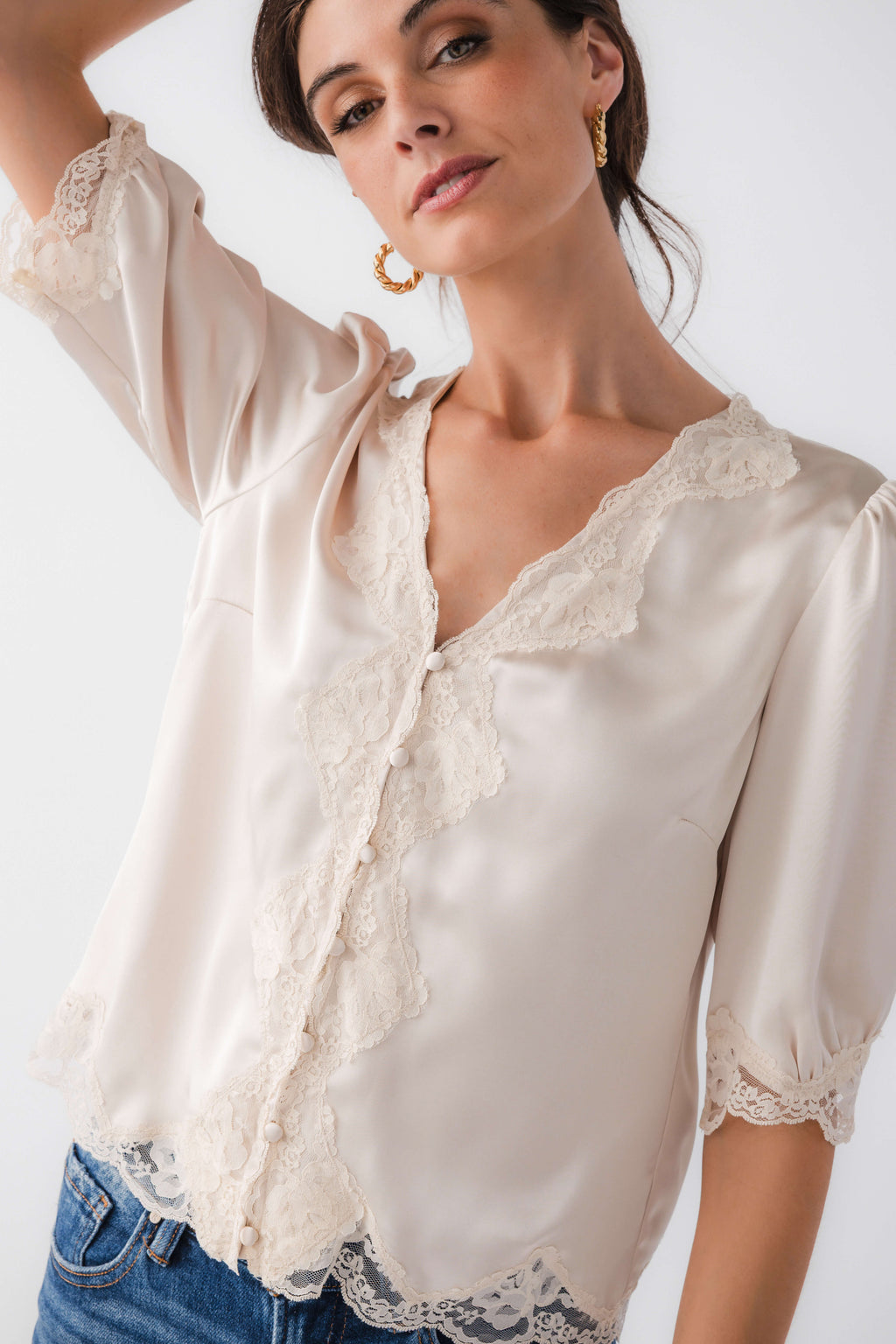 Ecru satin lace-trim blouse with V-neck lace placket and button-front detail