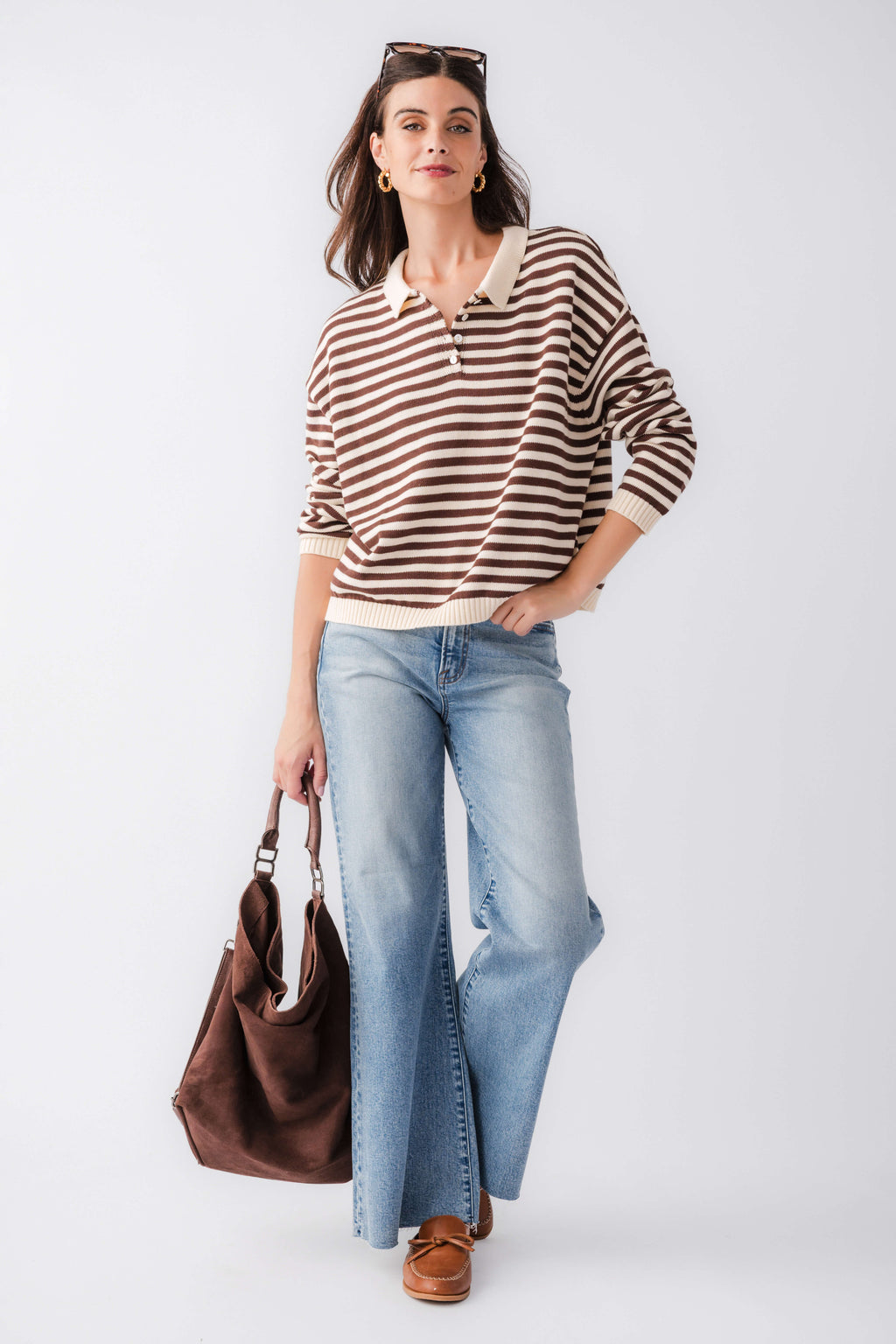 Cream and brown striped collared polo knit sweater with long sleeves and ribbed hem