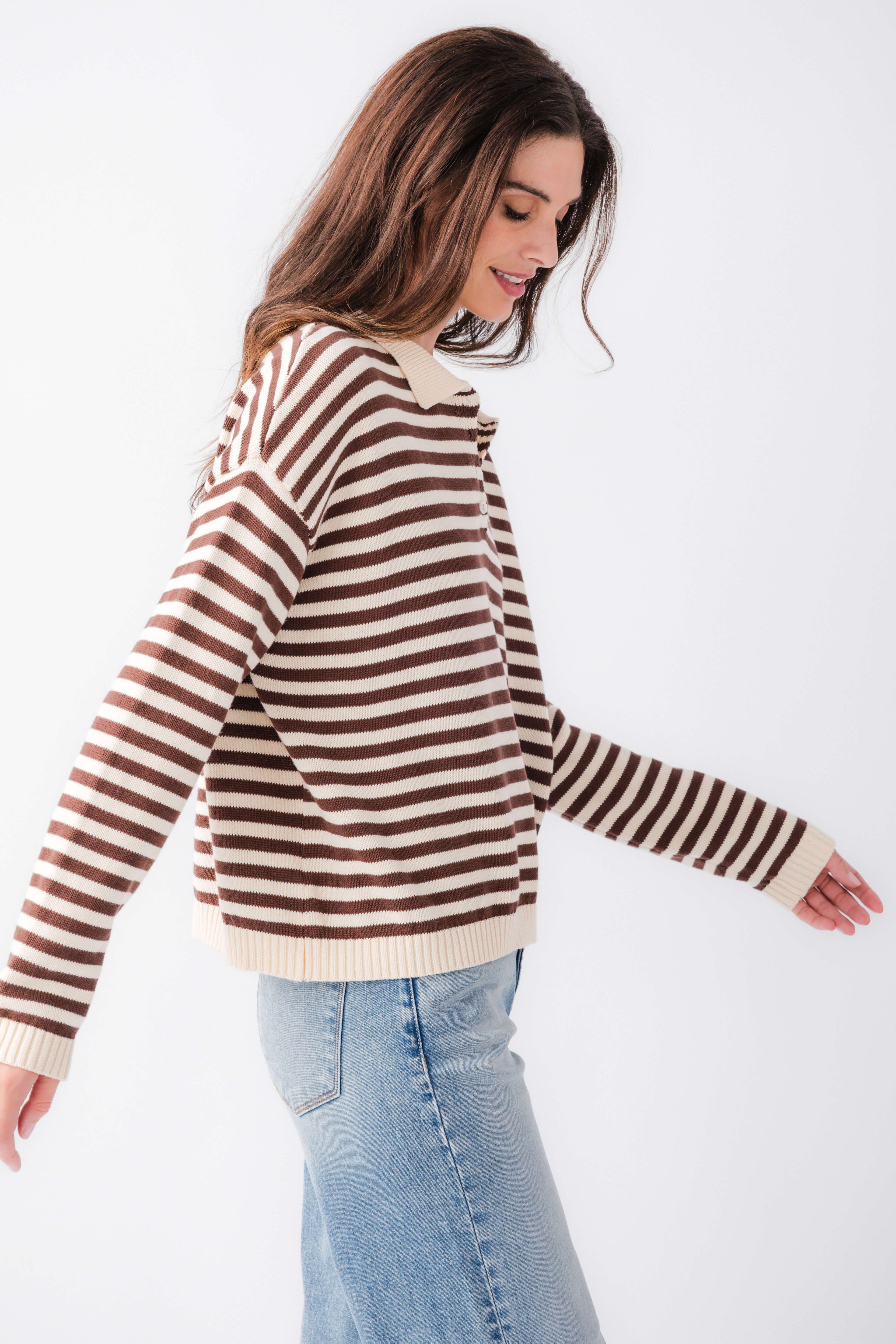 Cream and brown striped collared polo sweater with long sleeves and ribbed cuffs