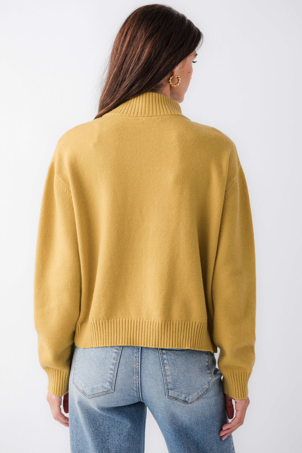 Women's gold half-zip turtleneck sweater, back view with ribbed collar and hem