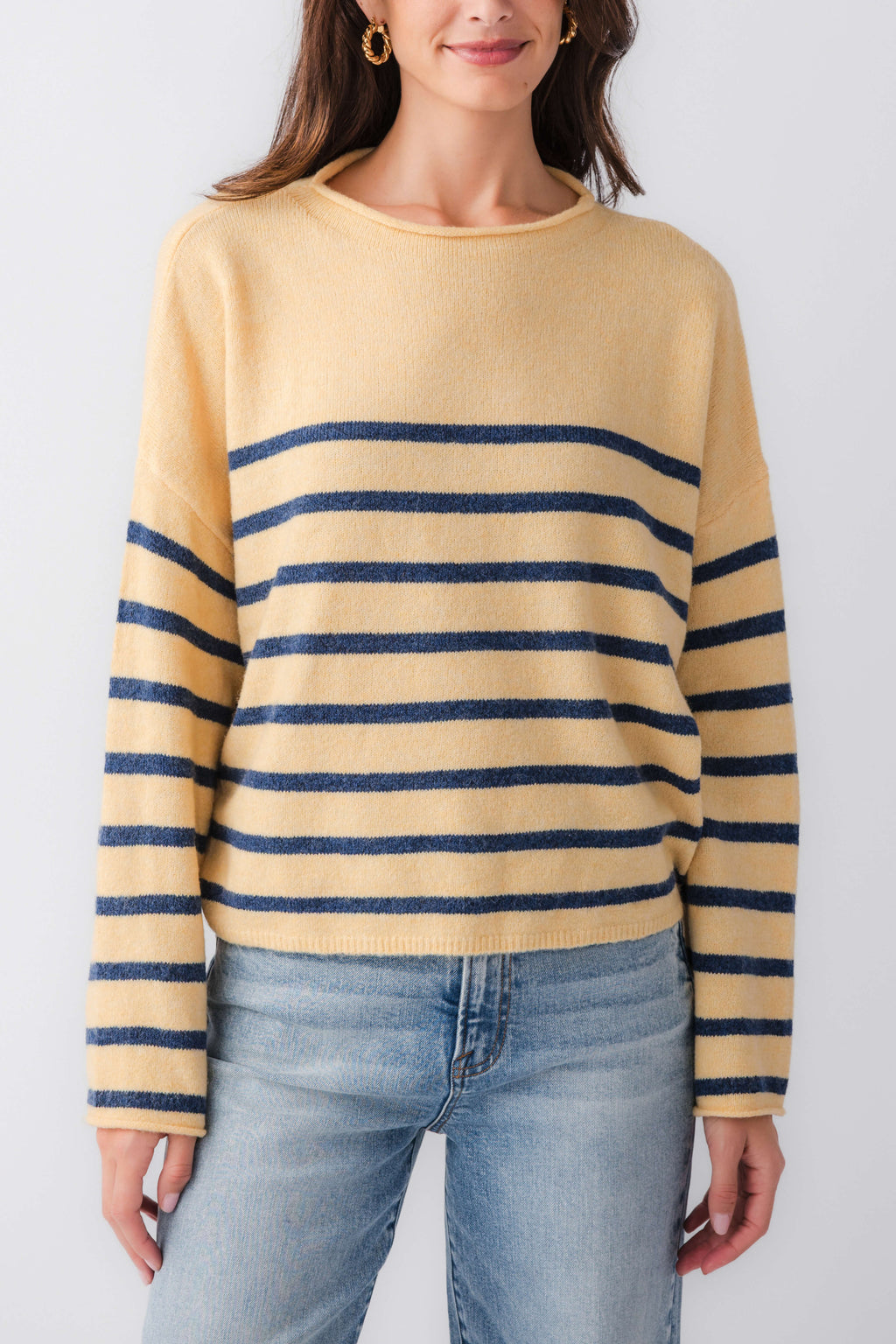 Butter yellow striped mockneck sweater with navy horizontal bands, long sleeves