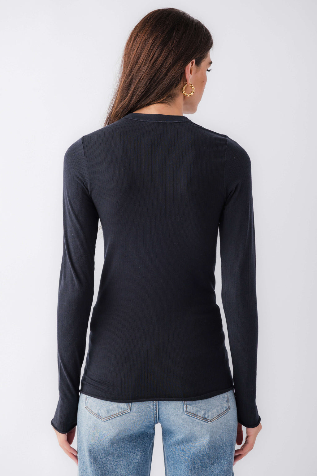 Black seamless long sleeve top, crew neck back view, fitted long sleeves
