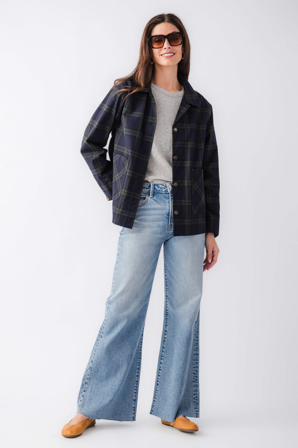 Navy and green plaid jacket with button front and pointed collar
