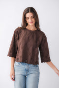 Brown eyelet scallop top with allover cutout embroidery and scalloped hem, elbow sleeves