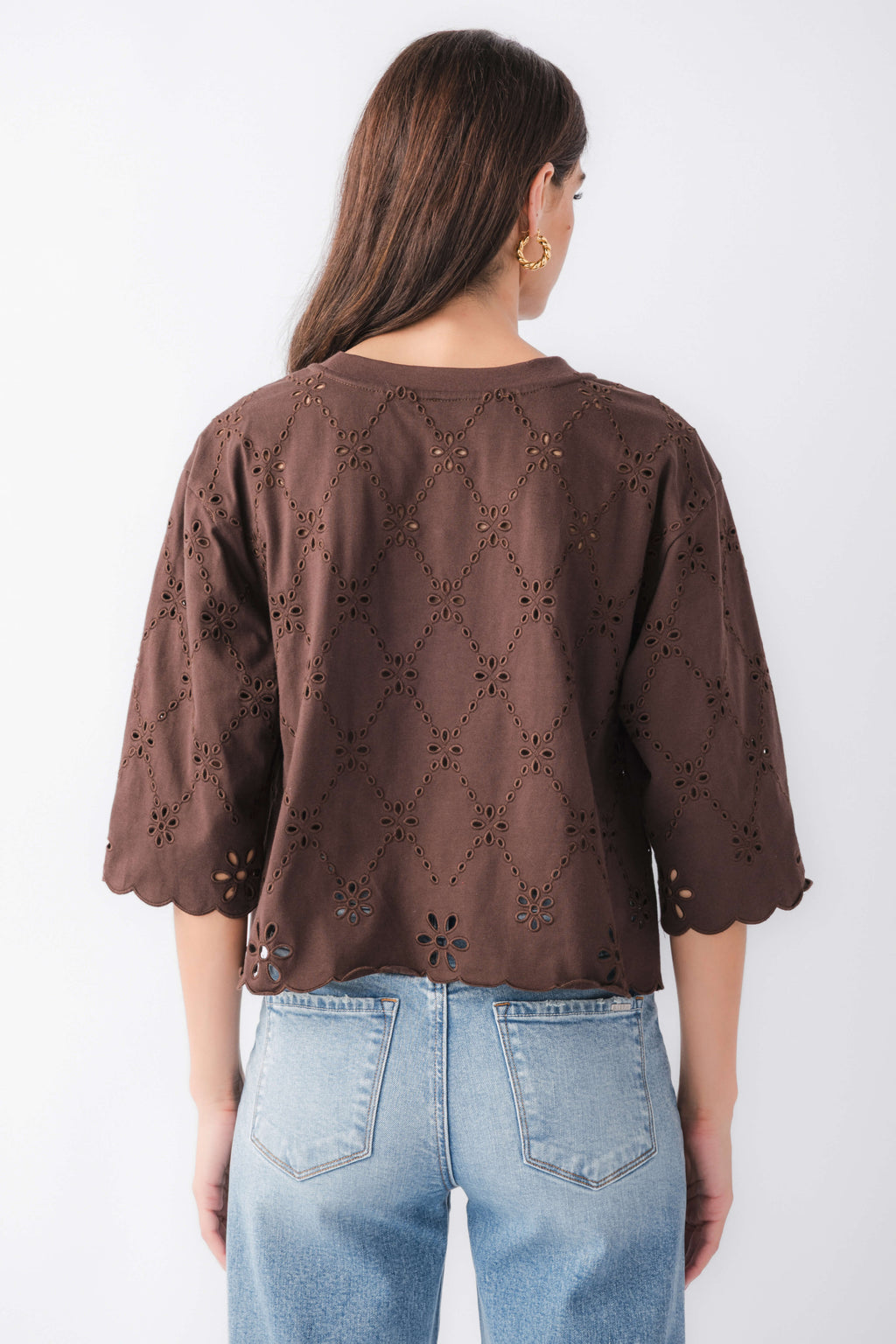 Brown eyelet scallop top back view with cutout pattern and scalloped hem, elbow sleeves