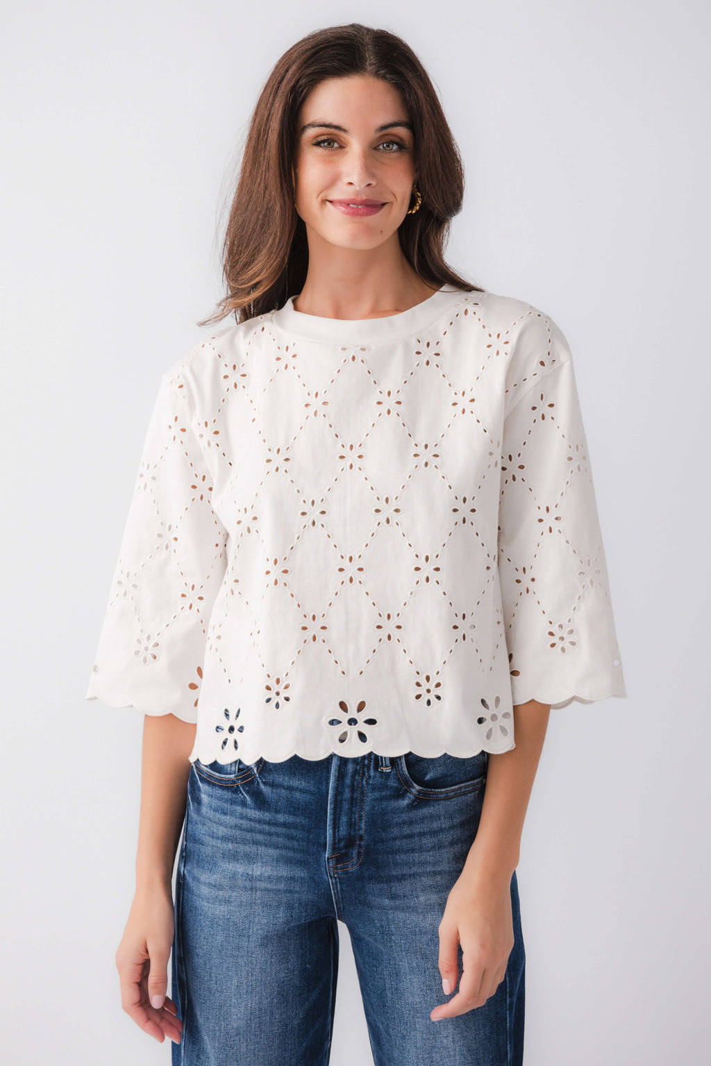 Ivory eyelet scallop top with cutout embroidery and scalloped hem, elbow-length sleeves