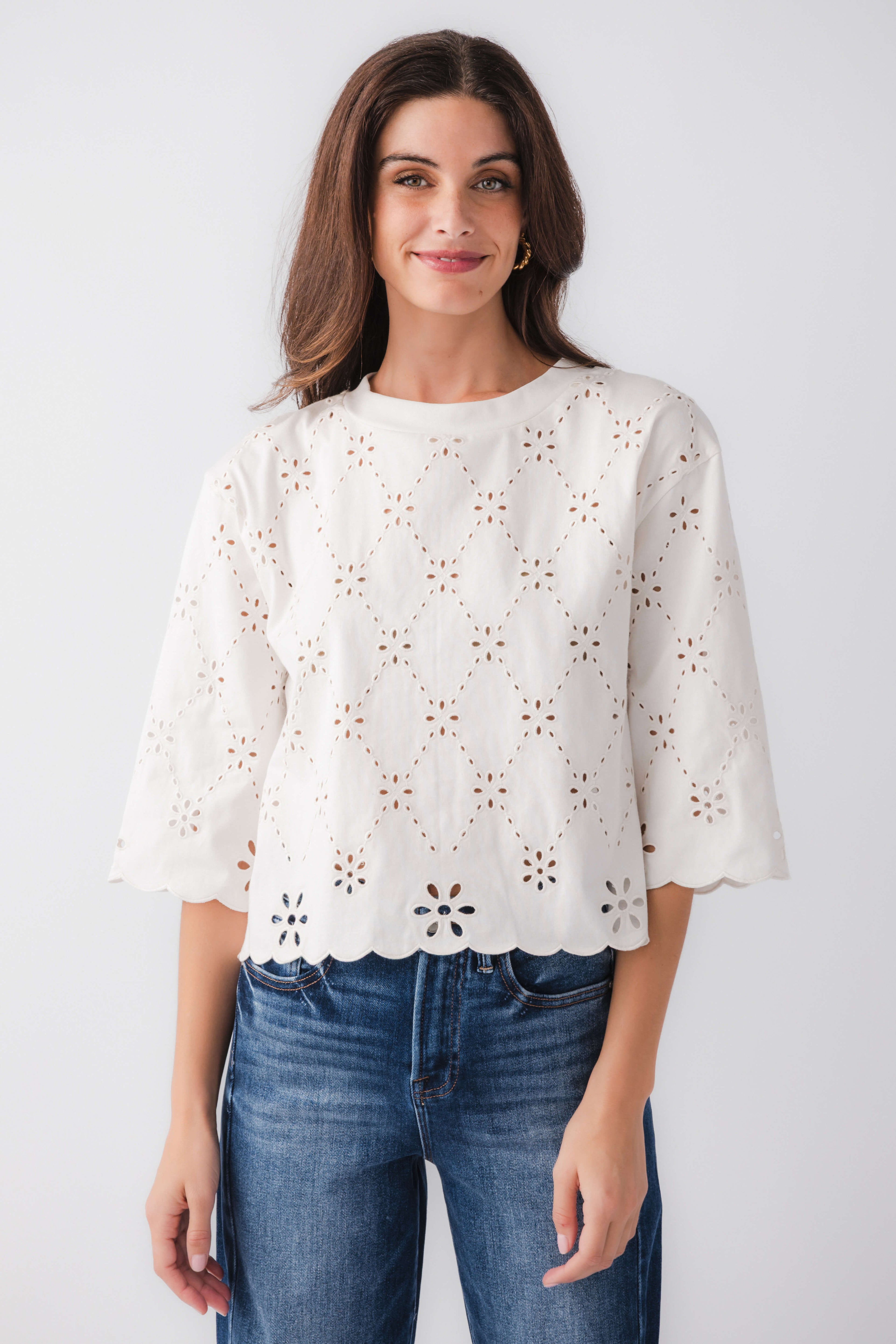 Ivory eyelet scallop top with cutout embroidery and scalloped hem, elbow-length sleeves