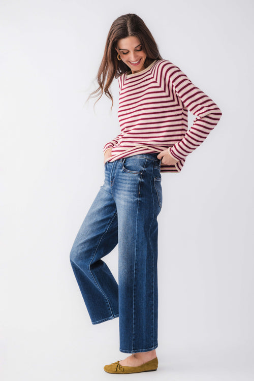 Burgundy and pink striped mockneck sweater with long sleeves, relaxed fit