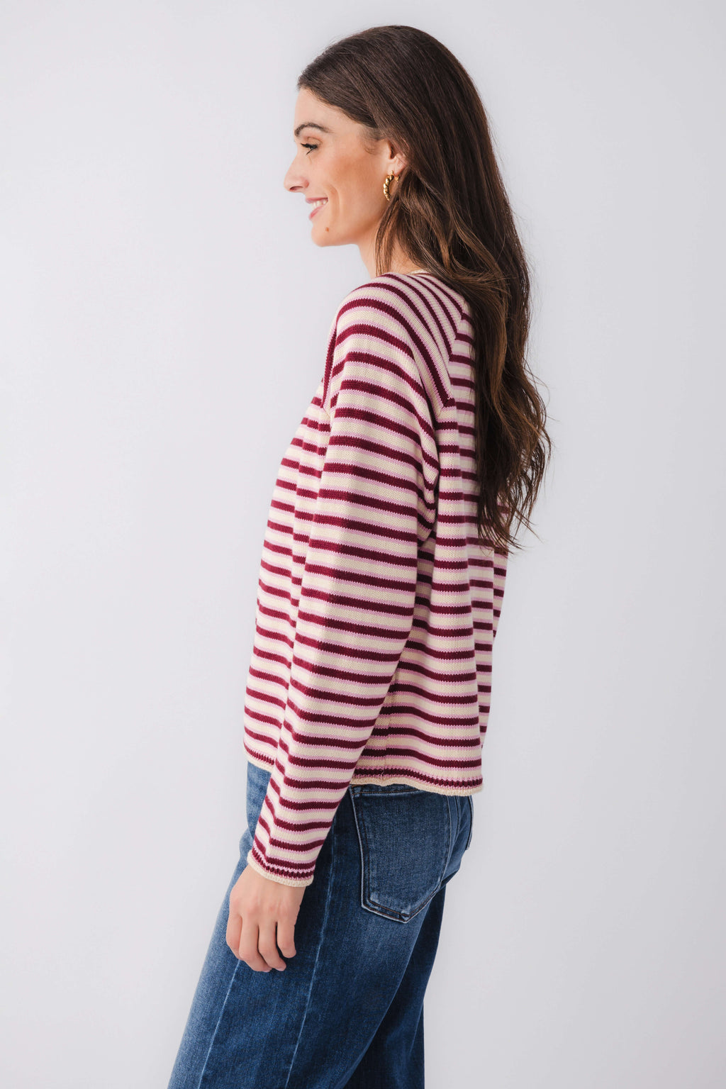 Burgundy and pink striped mockneck sweater, side view, long sleeves