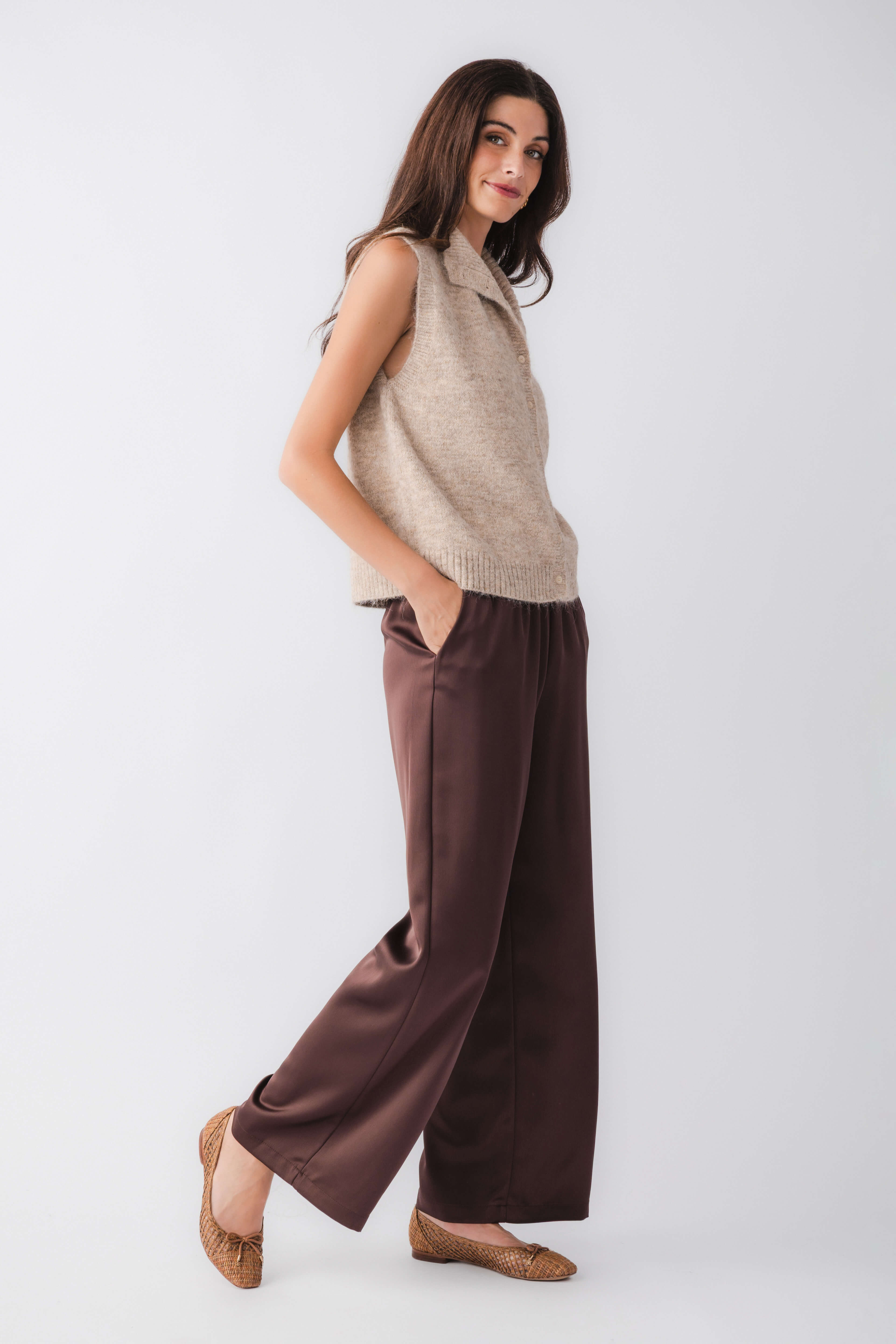 Taupe knit sweater vest, sleeveless with button front and relaxed fit