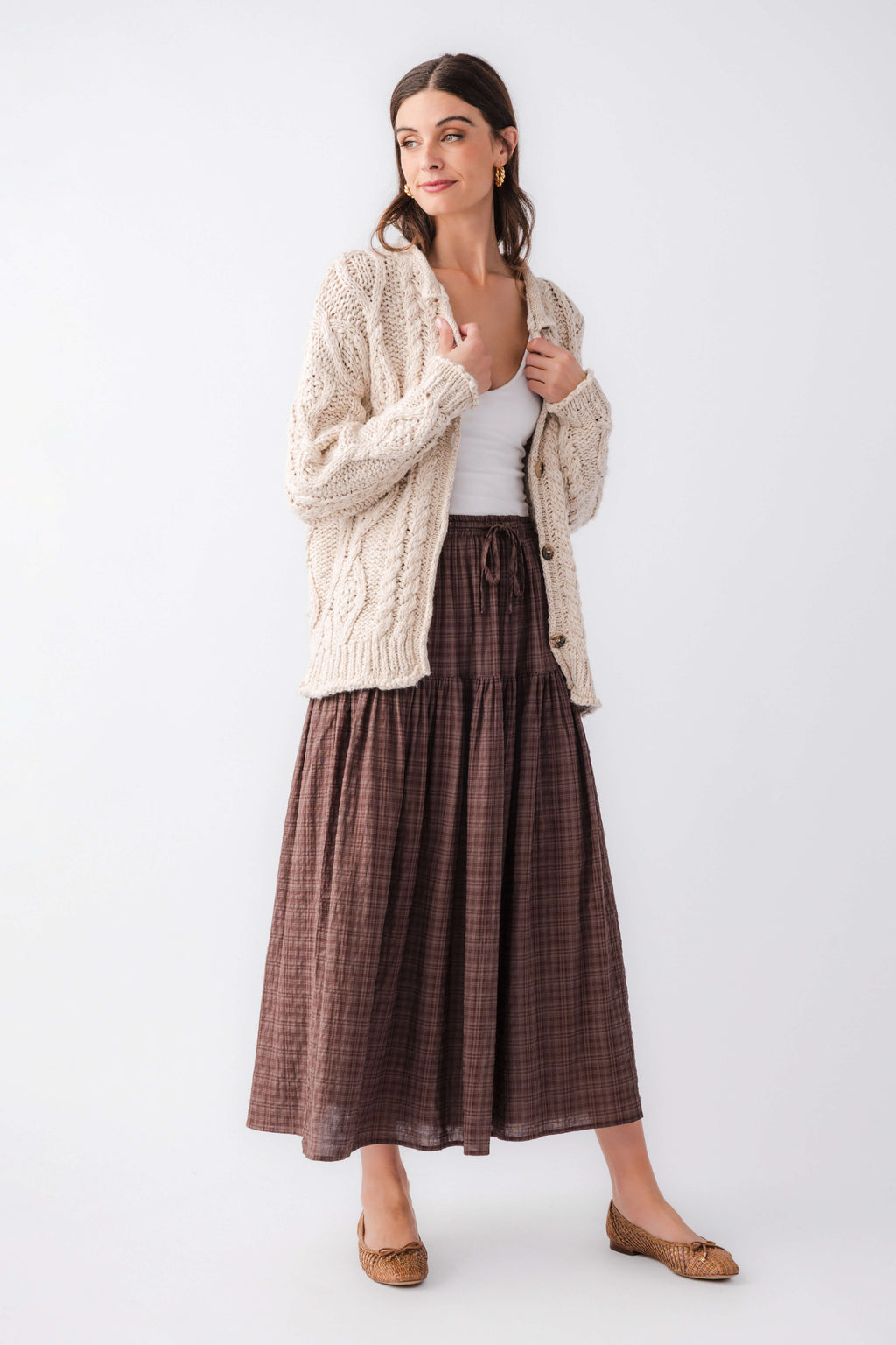 Brown plaid maxi skirt with elastic waistband and tiered layers