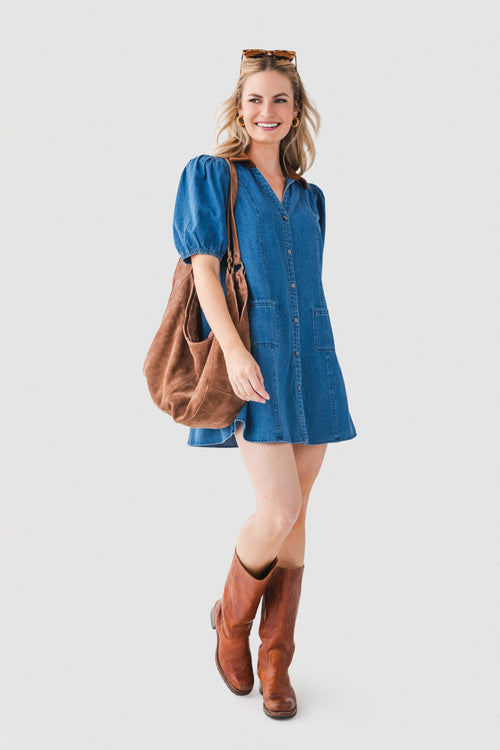 Denim mini dress with tan suede collar, button front, and side pockets