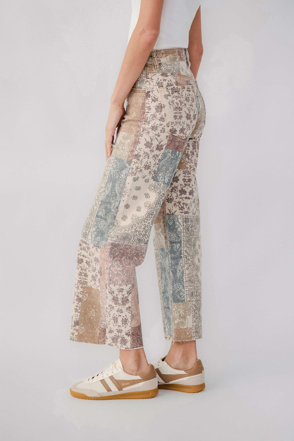 High-rise wide-leg patchwork paisley pants with earth-tone panel detail