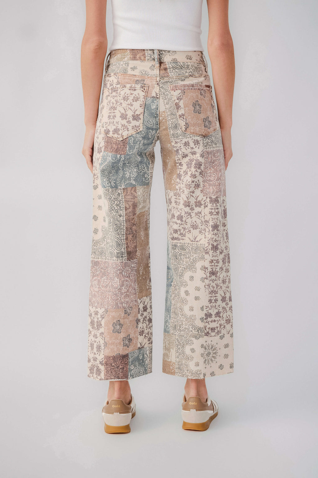 High-rise wide-leg patchwork paisley pants with mixed earth-tone blocks