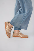 Mink suede low-top sneaker, side view with white laces and gum outsole