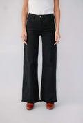 Black high-rise wide-leg jeans with raw hem and button fly