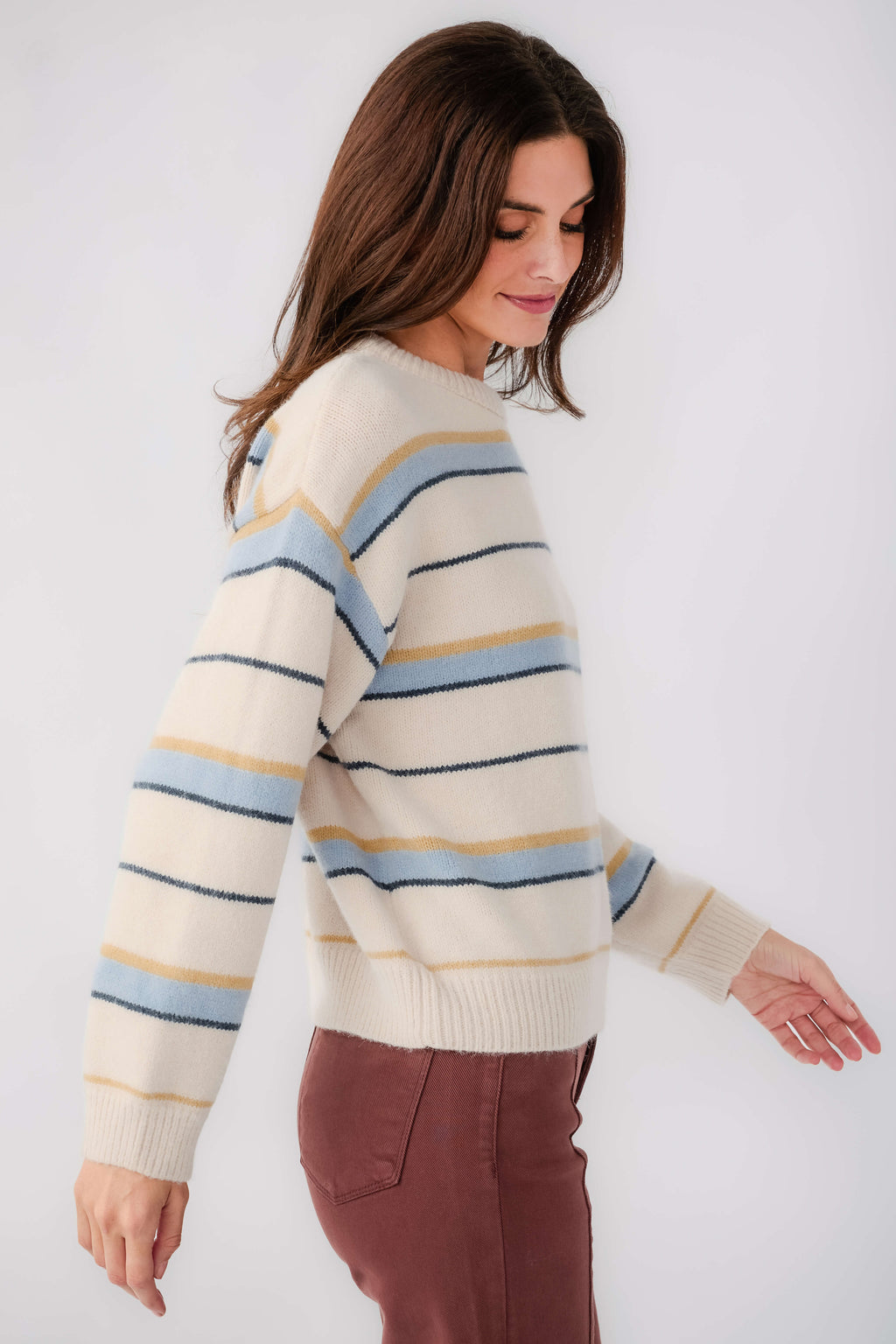 Striped knit sweater with long sleeves and crew neck, blue and yellow bands