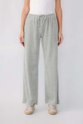 Grey velour wide-leg pants with elastic drawstring waist and relaxed fit
