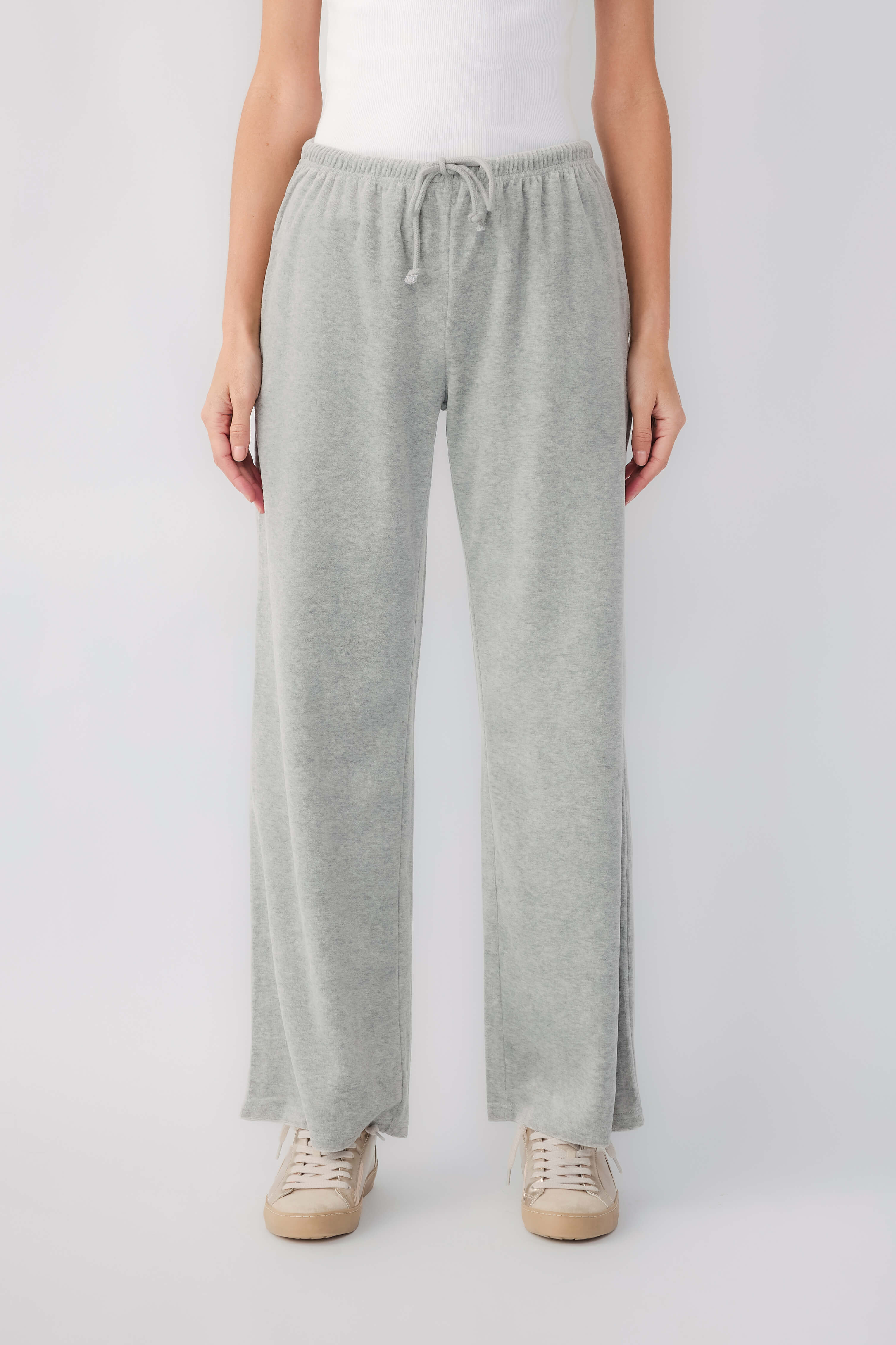 Grey velour wide-leg pants with elastic drawstring waist and relaxed fit