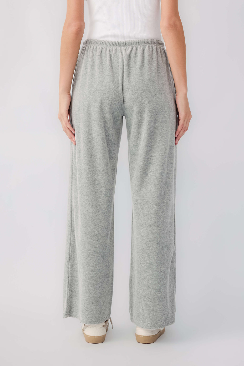 Grey velour wide-leg pants, front view; elastic waistband and flowing legs