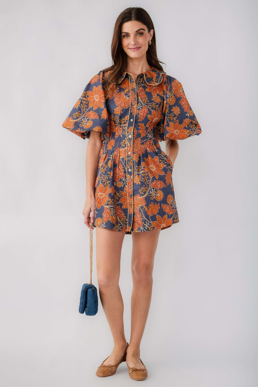 Floral printed short dress in dark navy with rust, peter pan collar, zip front