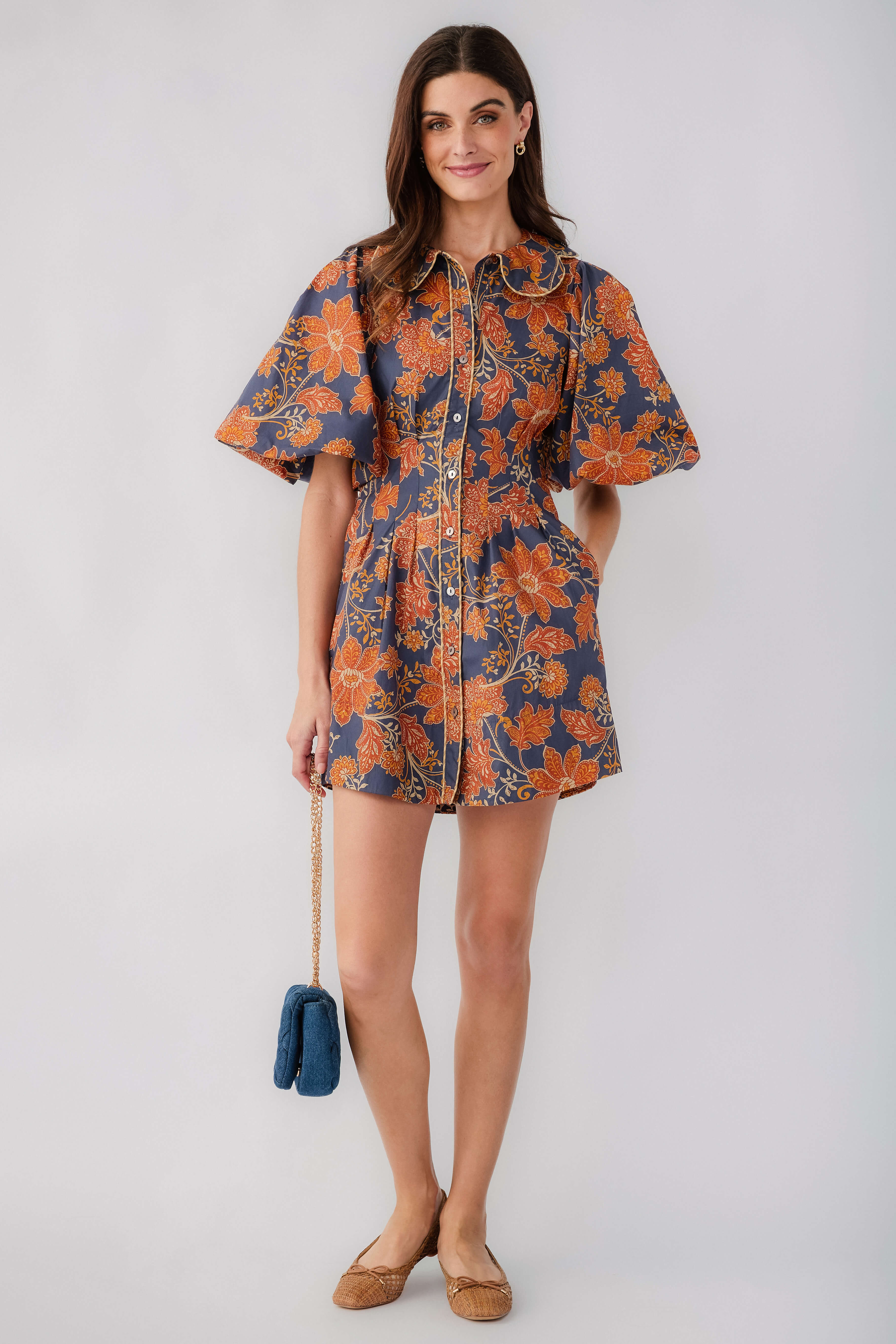 Floral printed short dress in dark navy with rust, peter pan collar, zip front