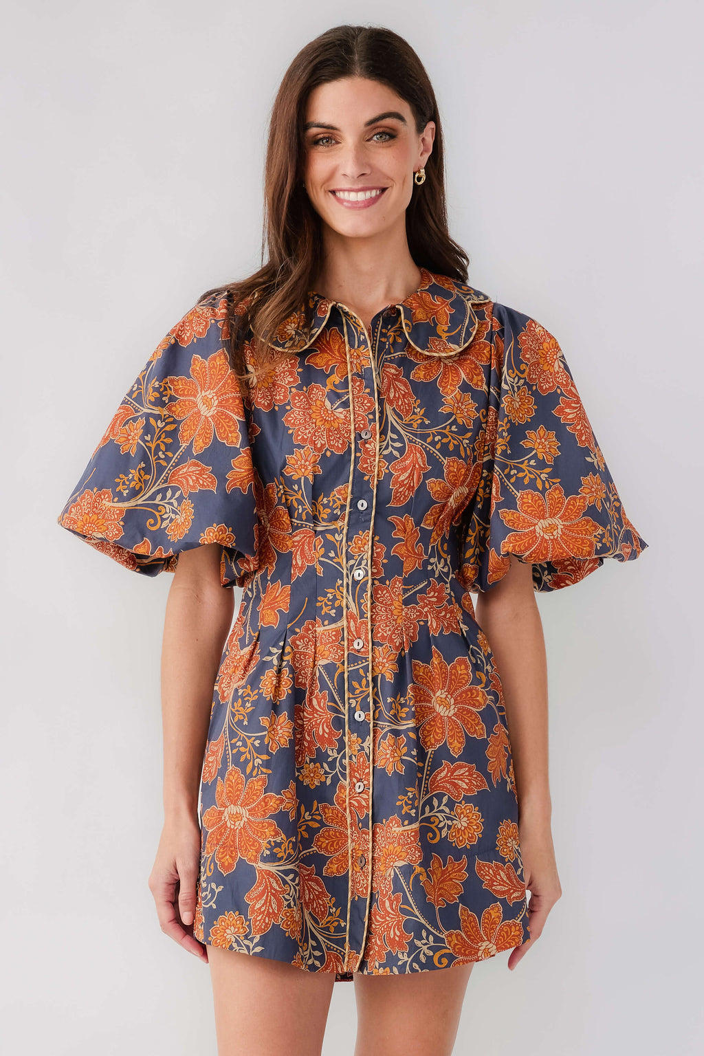 Floral printed short dress in dark navy with rust, peter pan collar, flutter sleeves