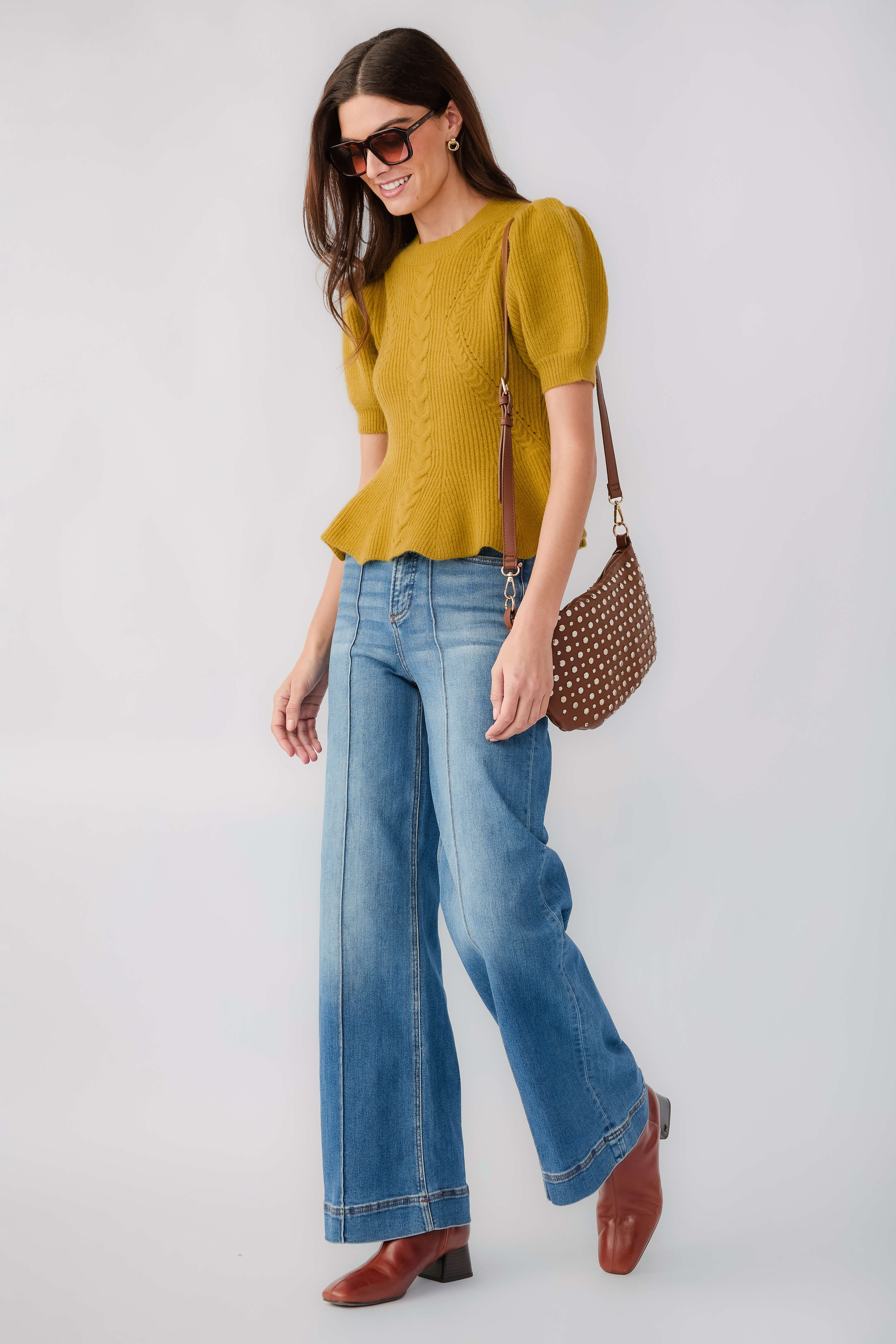 Chartreuse ribbed knit top with puff sleeves and crew neck, flared silhouette