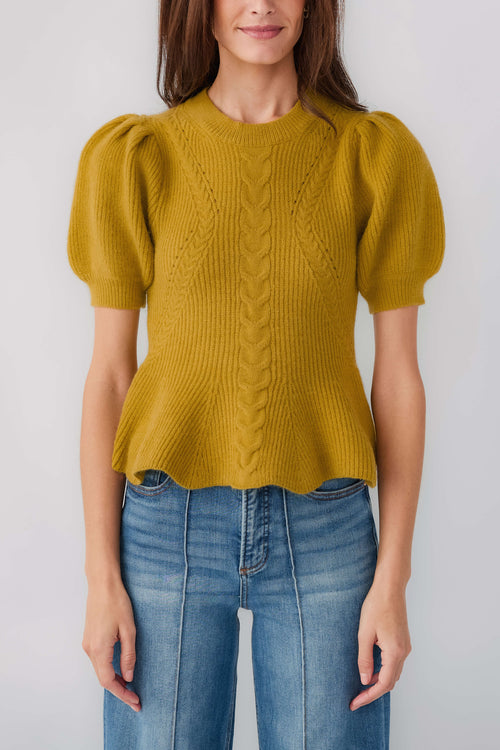 Chartreuse knit top with cable-knit front, puff sleeves, and flared waist