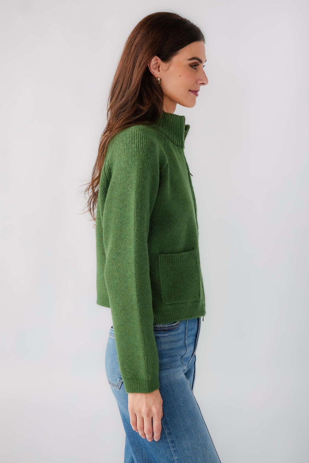 Forest green half-zip knit sweater with patch pocket, side profile