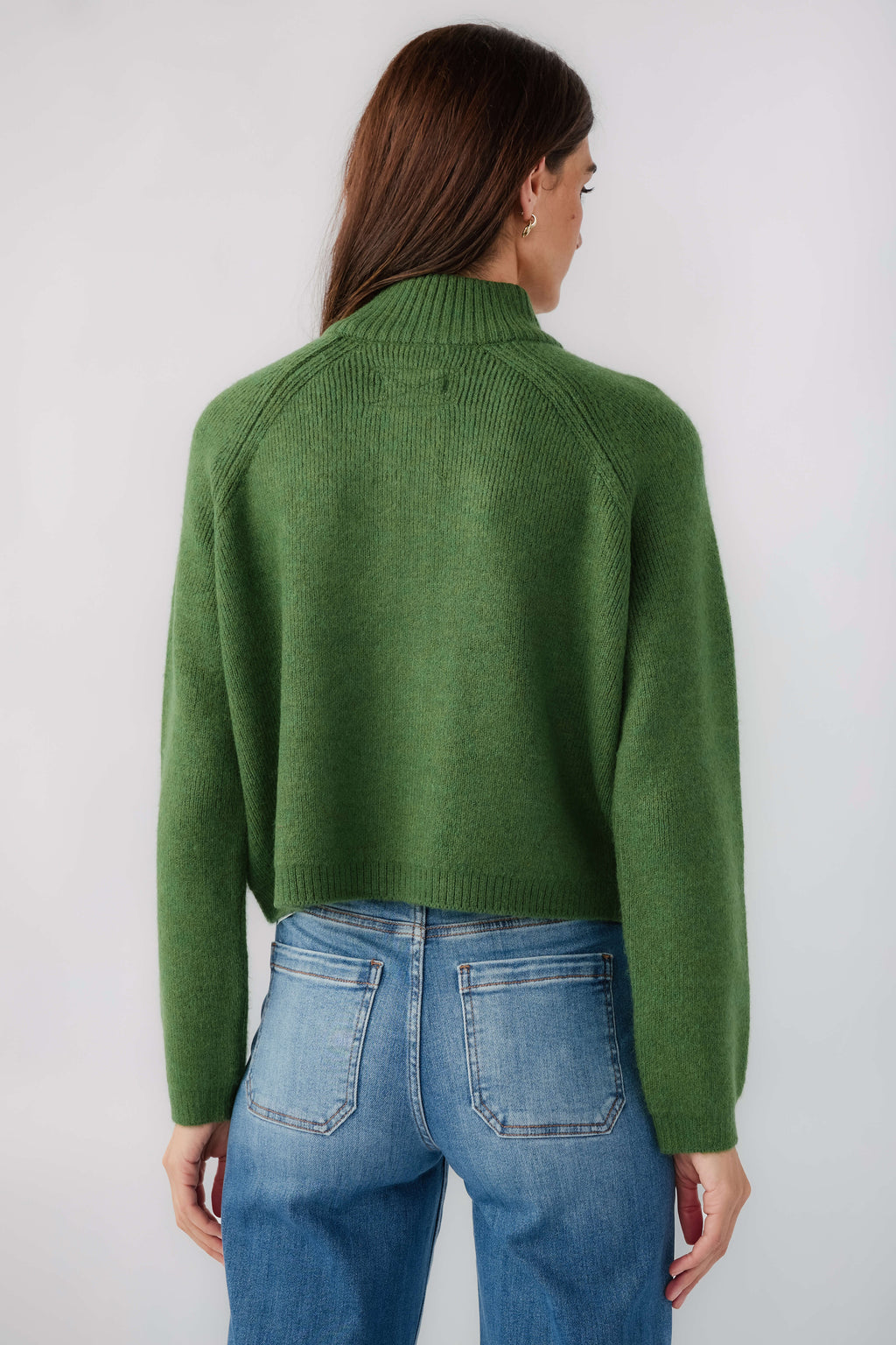 Forest green half-zip knit sweater, back view with ribbed hem