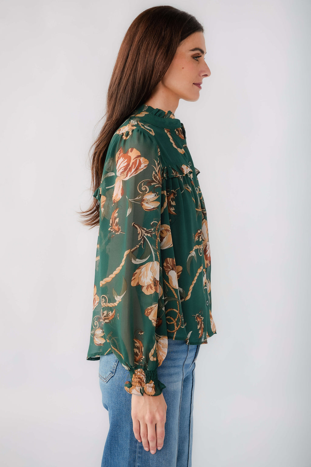 Women's dark green chain floral print button-up top with long sleeves, side view