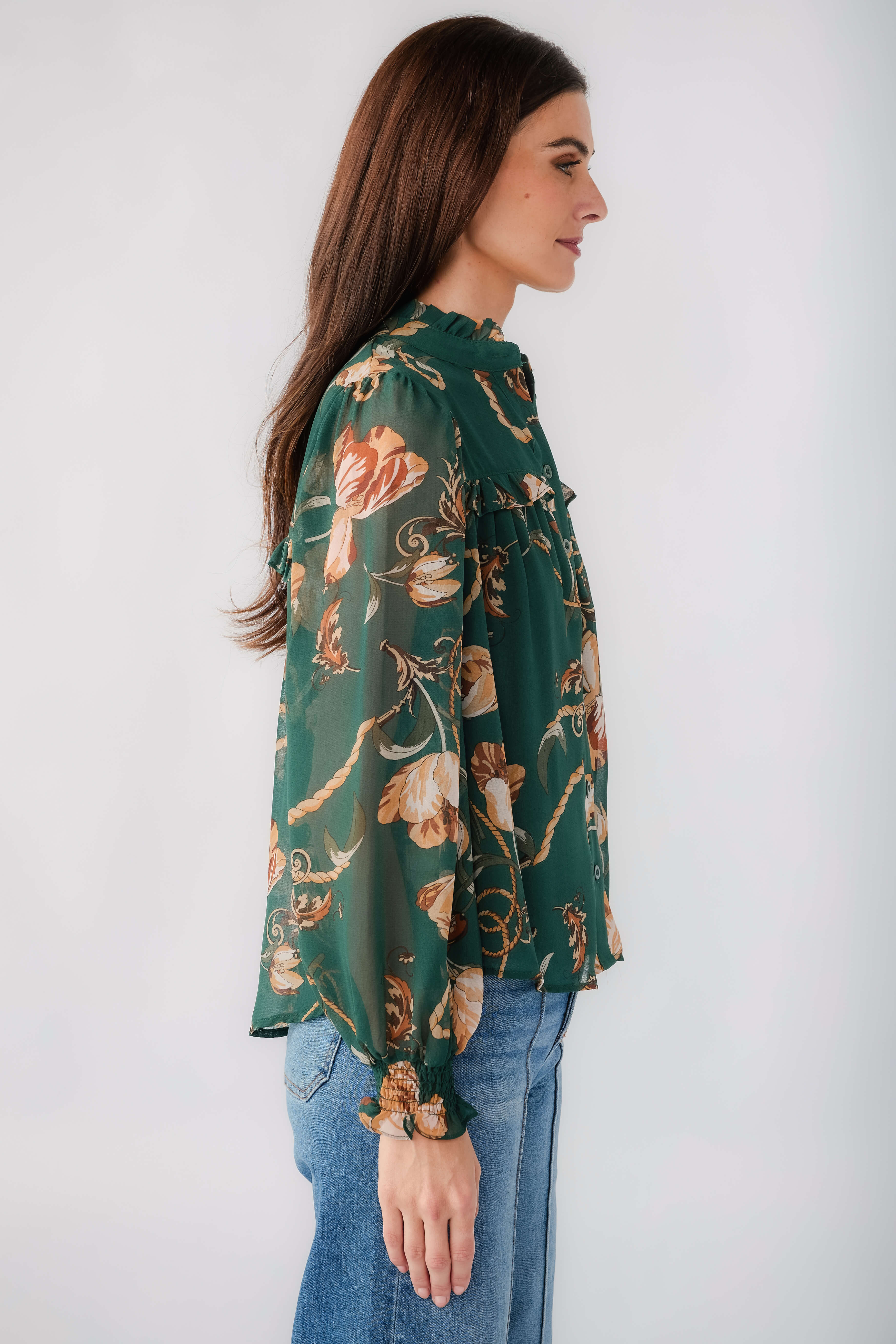 Women's dark green chain floral print button-up top with long sleeves, side view
