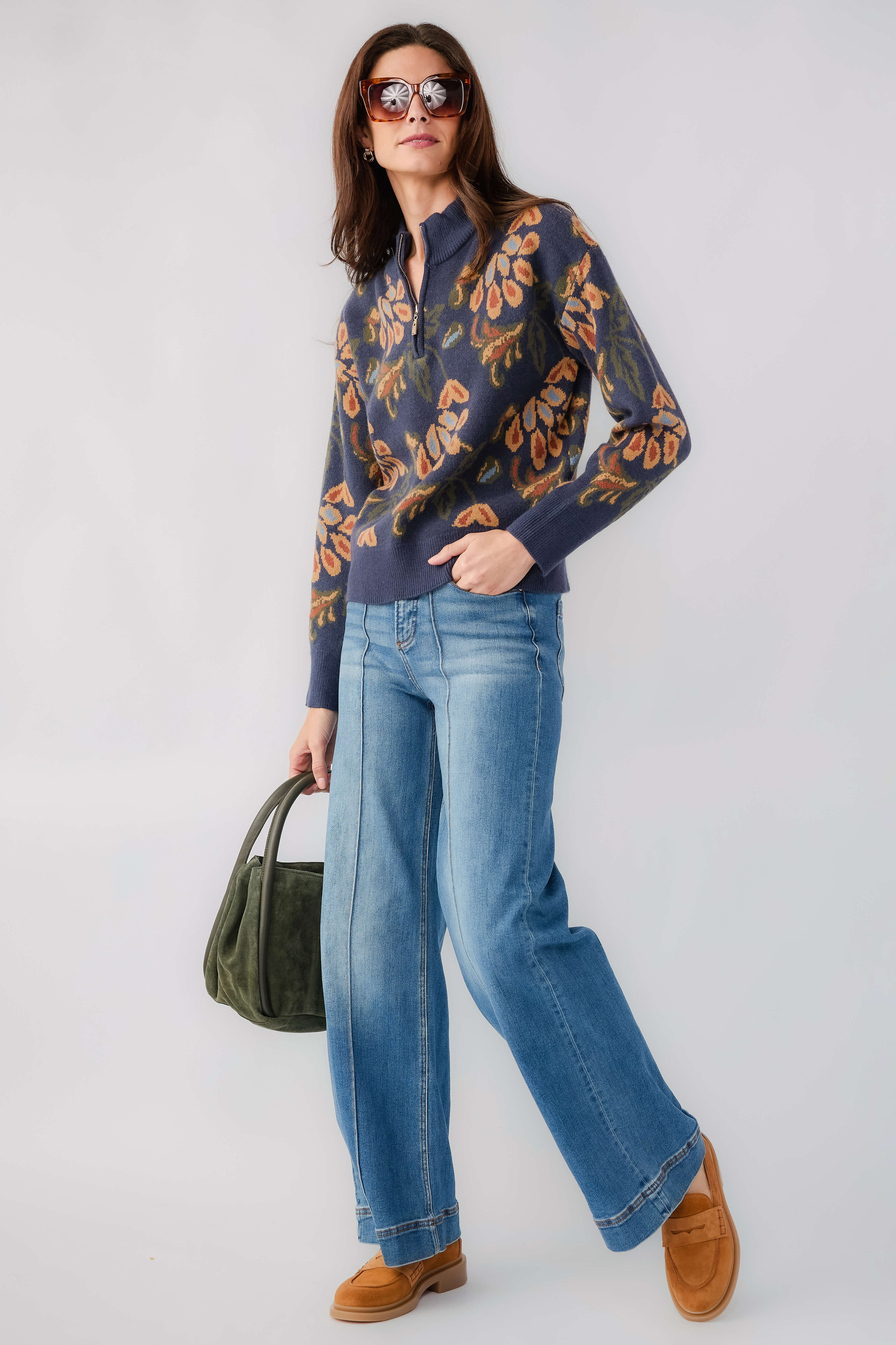 Dark denim floral print 1/4 zip sweater with long sleeves and ribbed hem cuffs