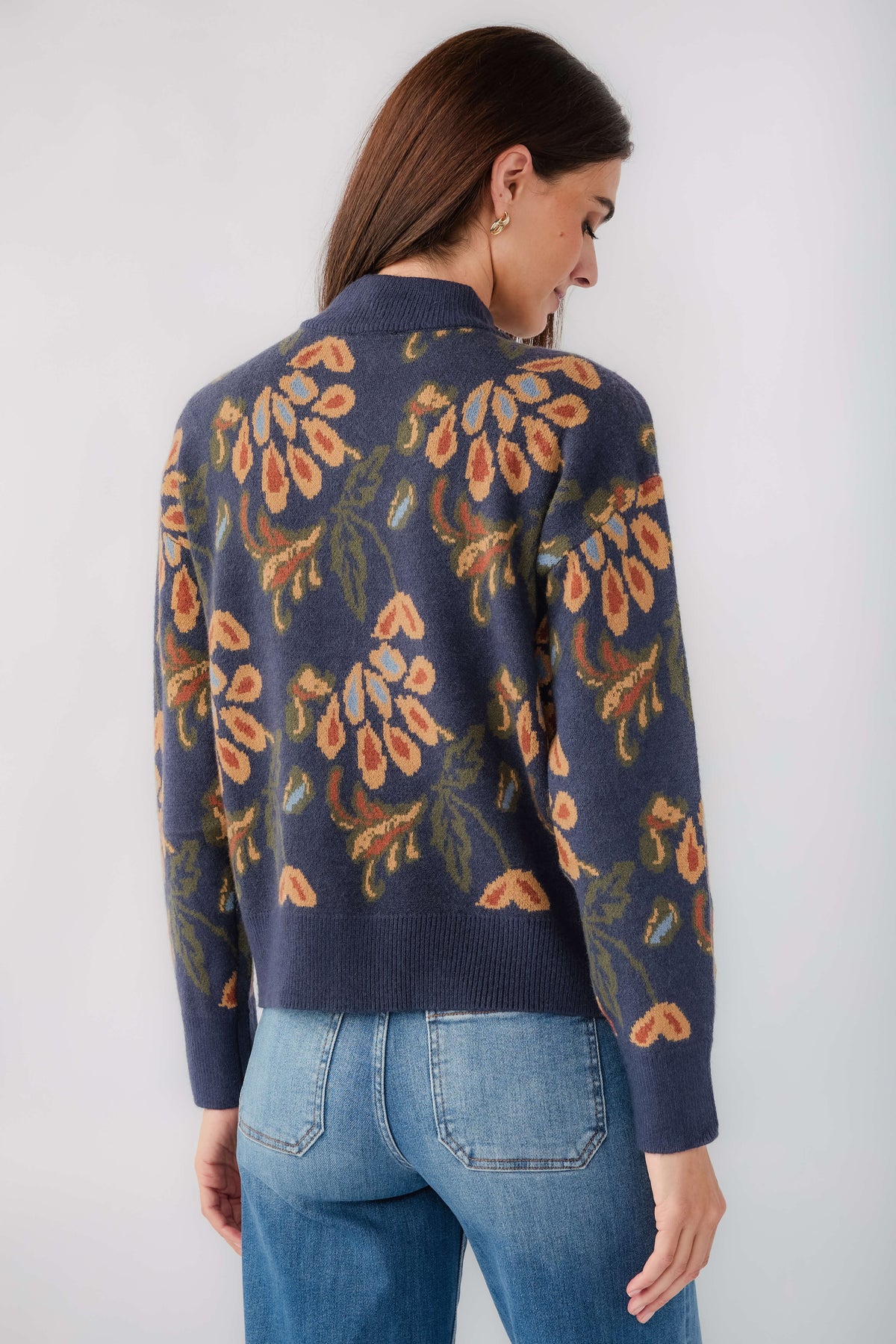 Dark denim floral print 1/4 zip sweater, back view with full pattern and long sleeves