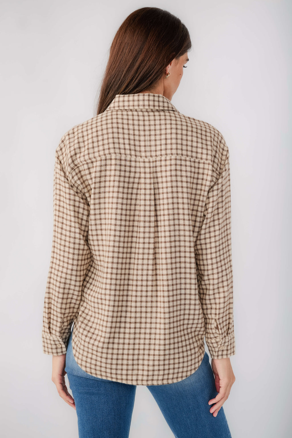 Back view of tan and brown plaid button-up shirt with front buttons