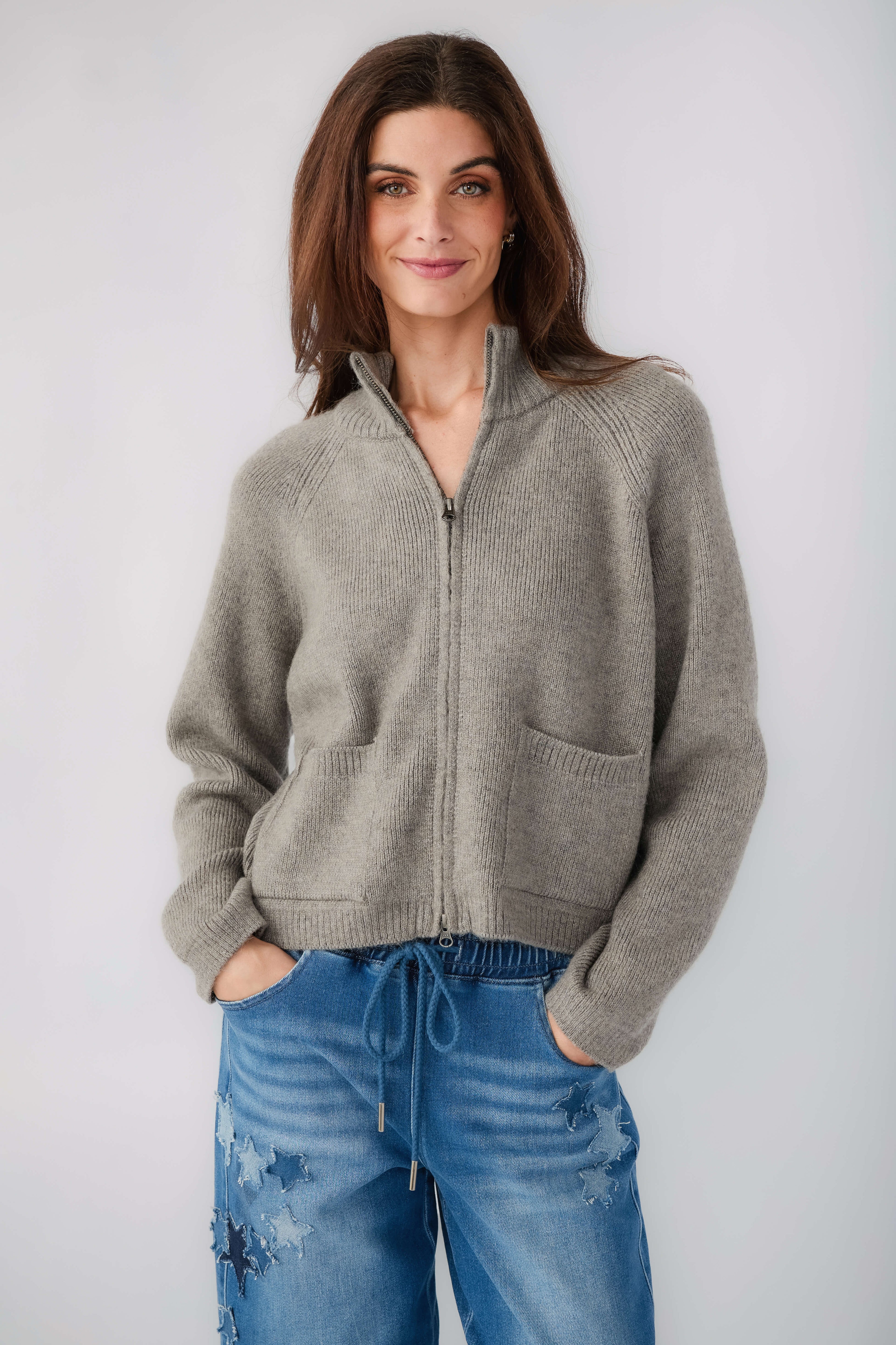 Cool grey half-zip knit sweater with front zipper and patch pocket