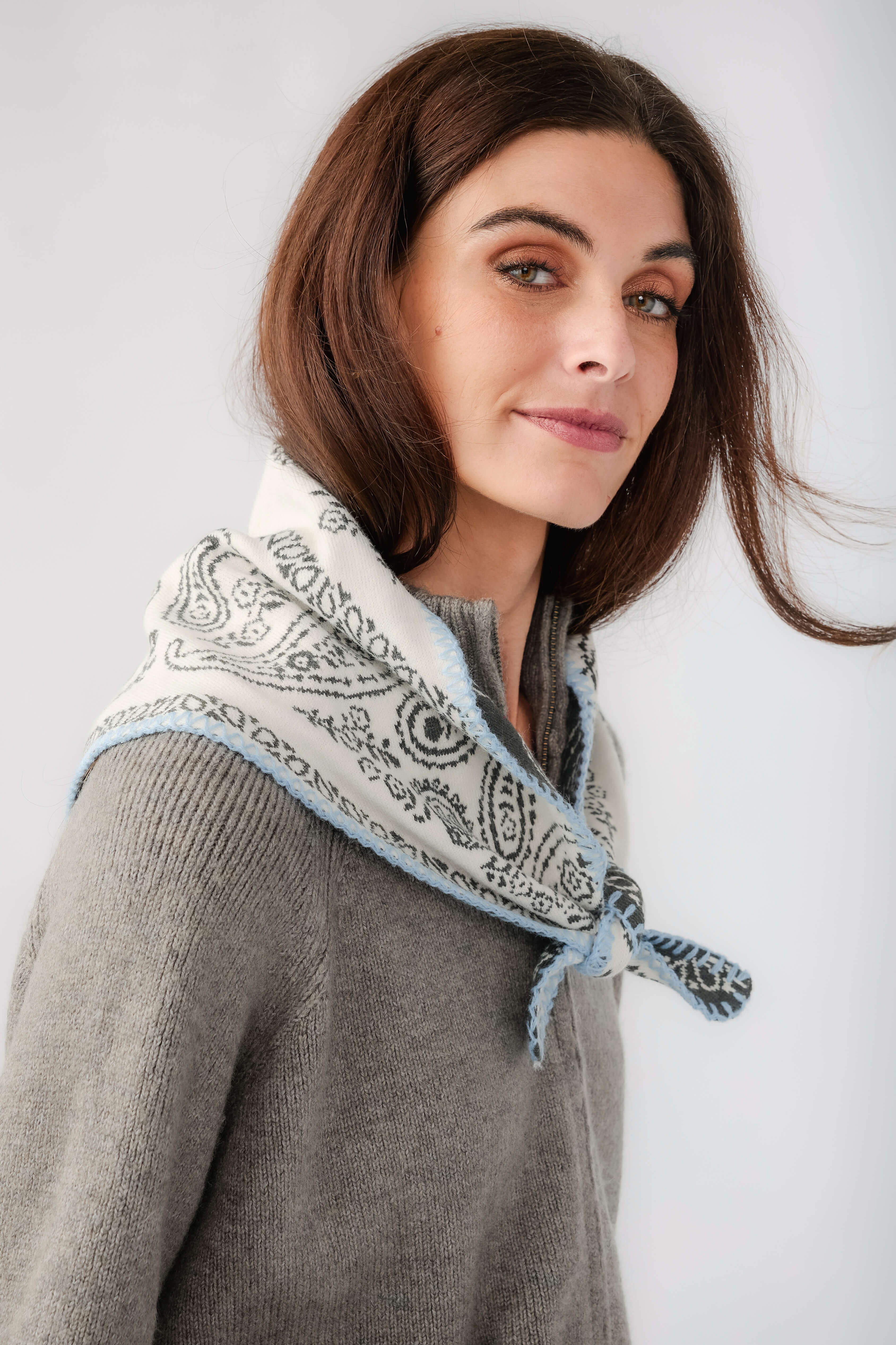 Free People knitted triangle scarf, gray with white paisley border and light-blue tie detail
