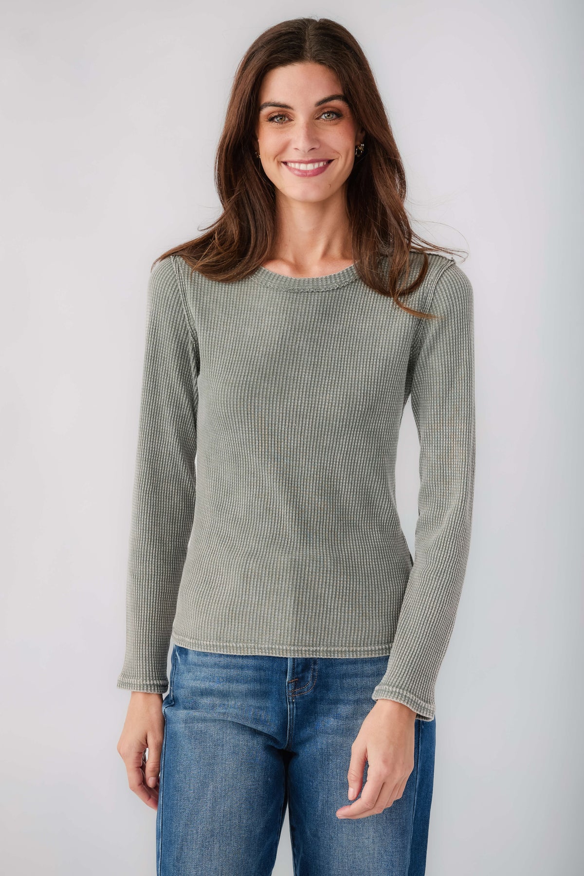 Light green thermal top with crew neck and long sleeves