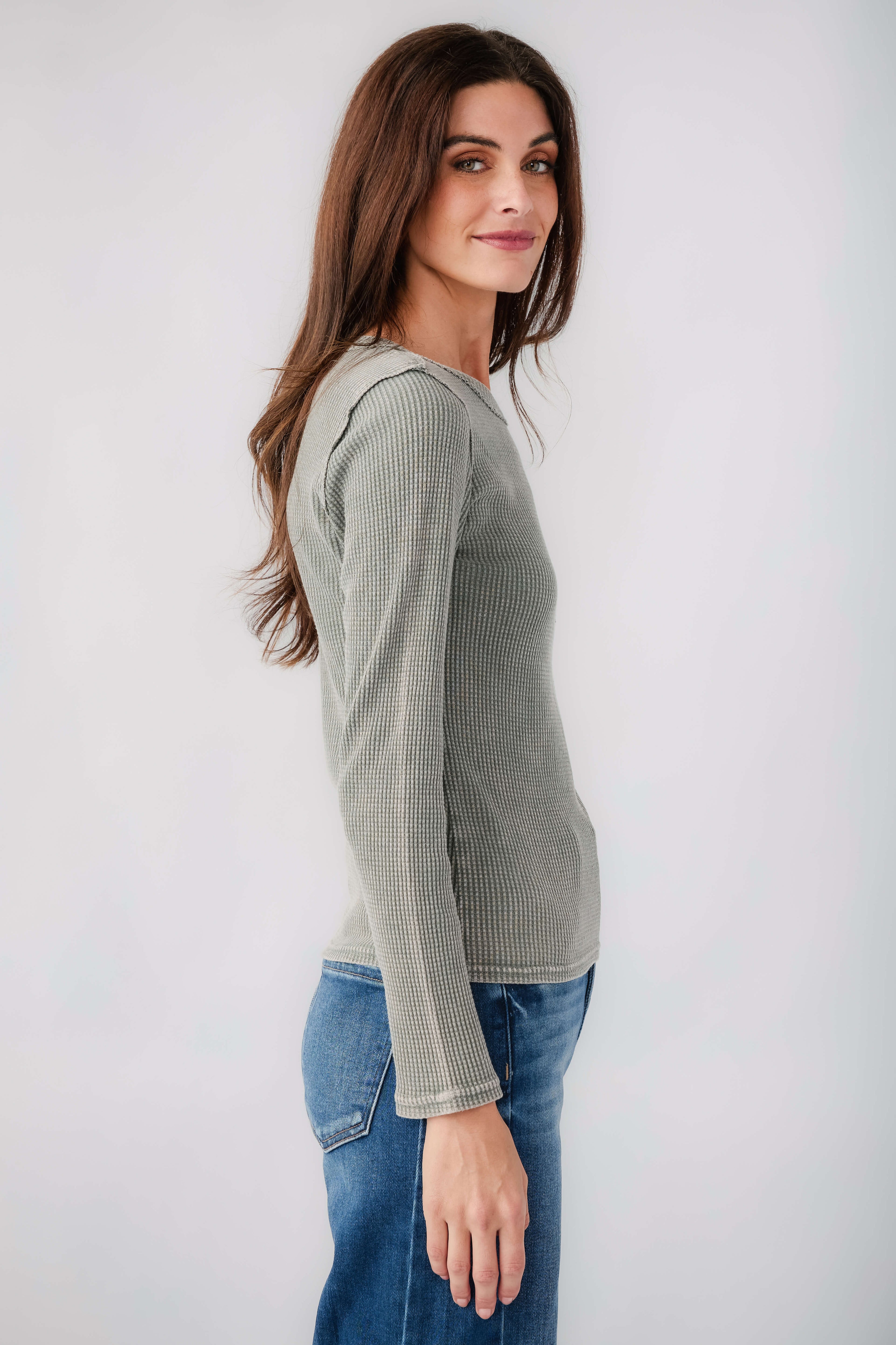 Light green thermal top with crew neck and long sleeves
